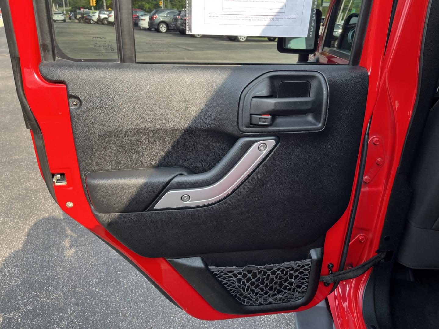 2014 Red /Black Jeep Wrangler Unlimited Sahara 4WD (1C4BJWEG7EL) with an 3.6L V6 DOHC 24V FFV engine, 5-Speed Automatic transmission, located at 547 E. Main St., Orwell, OH, 44076, (440) 437-5893, 41.535435, -80.847855 - 2014 Jeep Wrangler Unlimited Sahara 4WD – Flame Red with Trail Rated Capability and Classic Wrangler Style! This 2014 Jeep Wrangler Unlimited Sahara is a clean and capable 4-door ready for trails, daily driving, or weekend adventures. Powered by the reliable 3.6L Pentastar V6 engine paired with a- Photo#29