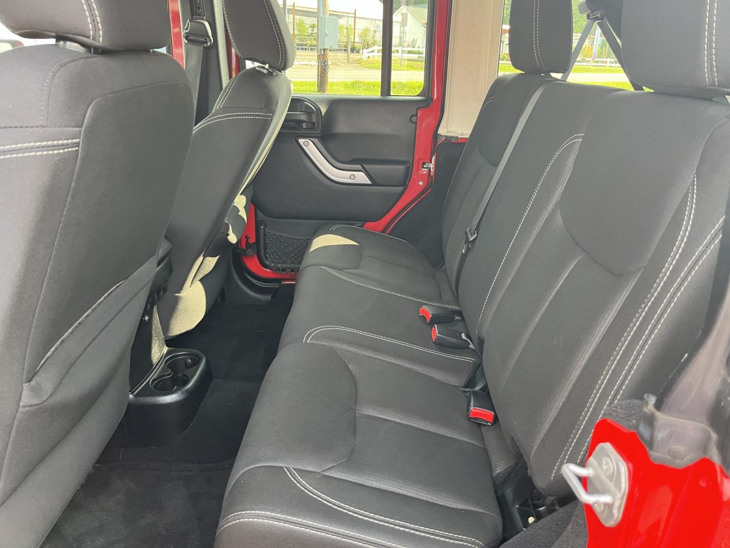 2014 Red /Black Jeep Wrangler Unlimited Sahara 4WD (1C4BJWEG7EL) with an 3.6L V6 DOHC 24V FFV engine, 5-Speed Automatic transmission, located at 547 E. Main St., Orwell, OH, 44076, (440) 437-5893, 41.535435, -80.847855 - 2014 Jeep Wrangler Unlimited Sahara 4WD – Flame Red with Trail Rated Capability and Classic Wrangler Style! This 2014 Jeep Wrangler Unlimited Sahara is a clean and capable 4-door ready for trails, daily driving, or weekend adventures. Powered by the reliable 3.6L Pentastar V6 engine paired with a- Photo#30