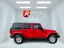 2014 Red /Black Jeep Wrangler Unlimited Sahara 4WD (1C4BJWEG7EL) with an 3.6L V6 DOHC 24V FFV engine, 5-Speed Automatic transmission, located at 547 E. Main St., Orwell, OH, 44076, (440) 437-5893, 41.535435, -80.847855 - 2014 Jeep Wrangler Unlimited Sahara 4WD – Flame Red with Trail Rated Capability and Classic Wrangler Style! This 2014 Jeep Wrangler Unlimited Sahara is a clean and capable 4-door ready for trails, daily driving, or weekend adventures. Powered by the reliable 3.6L Pentastar V6 engine paired with a- Photo#5