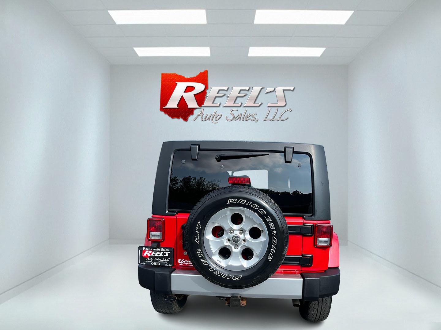 2014 Red /Black Jeep Wrangler Unlimited Sahara 4WD (1C4BJWEG7EL) with an 3.6L V6 DOHC 24V FFV engine, 5-Speed Automatic transmission, located at 547 E. Main St., Orwell, OH, 44076, (440) 437-5893, 41.535435, -80.847855 - 2014 Jeep Wrangler Unlimited Sahara 4WD – Flame Red with Trail Rated Capability and Classic Wrangler Style! This 2014 Jeep Wrangler Unlimited Sahara is a clean and capable 4-door ready for trails, daily driving, or weekend adventures. Powered by the reliable 3.6L Pentastar V6 engine paired with a- Photo#8