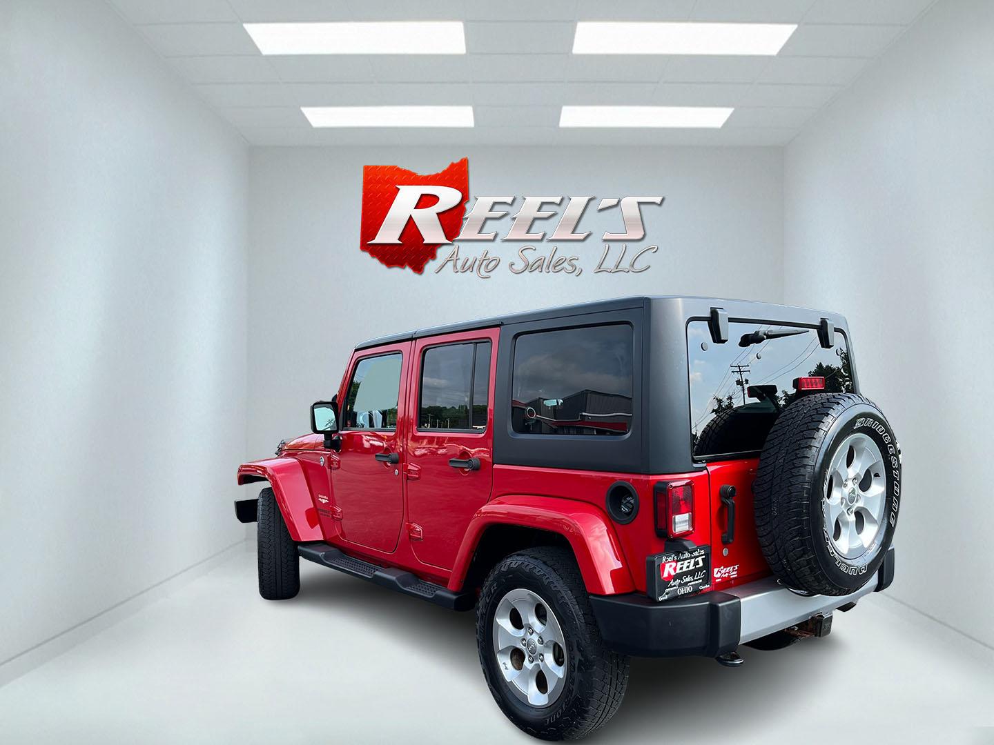 2014 Red /Black Jeep Wrangler Unlimited Sahara 4WD (1C4BJWEG7EL) with an 3.6L V6 DOHC 24V FFV engine, 5-Speed Automatic transmission, located at 547 E. Main St., Orwell, OH, 44076, (440) 437-5893, 41.535435, -80.847855 - 2014 Jeep Wrangler Unlimited Sahara 4WD – Flame Red with Trail Rated Capability and Classic Wrangler Style! This 2014 Jeep Wrangler Unlimited Sahara is a clean and capable 4-door ready for trails, daily driving, or weekend adventures. Powered by the reliable 3.6L Pentastar V6 engine paired with a- Photo#9