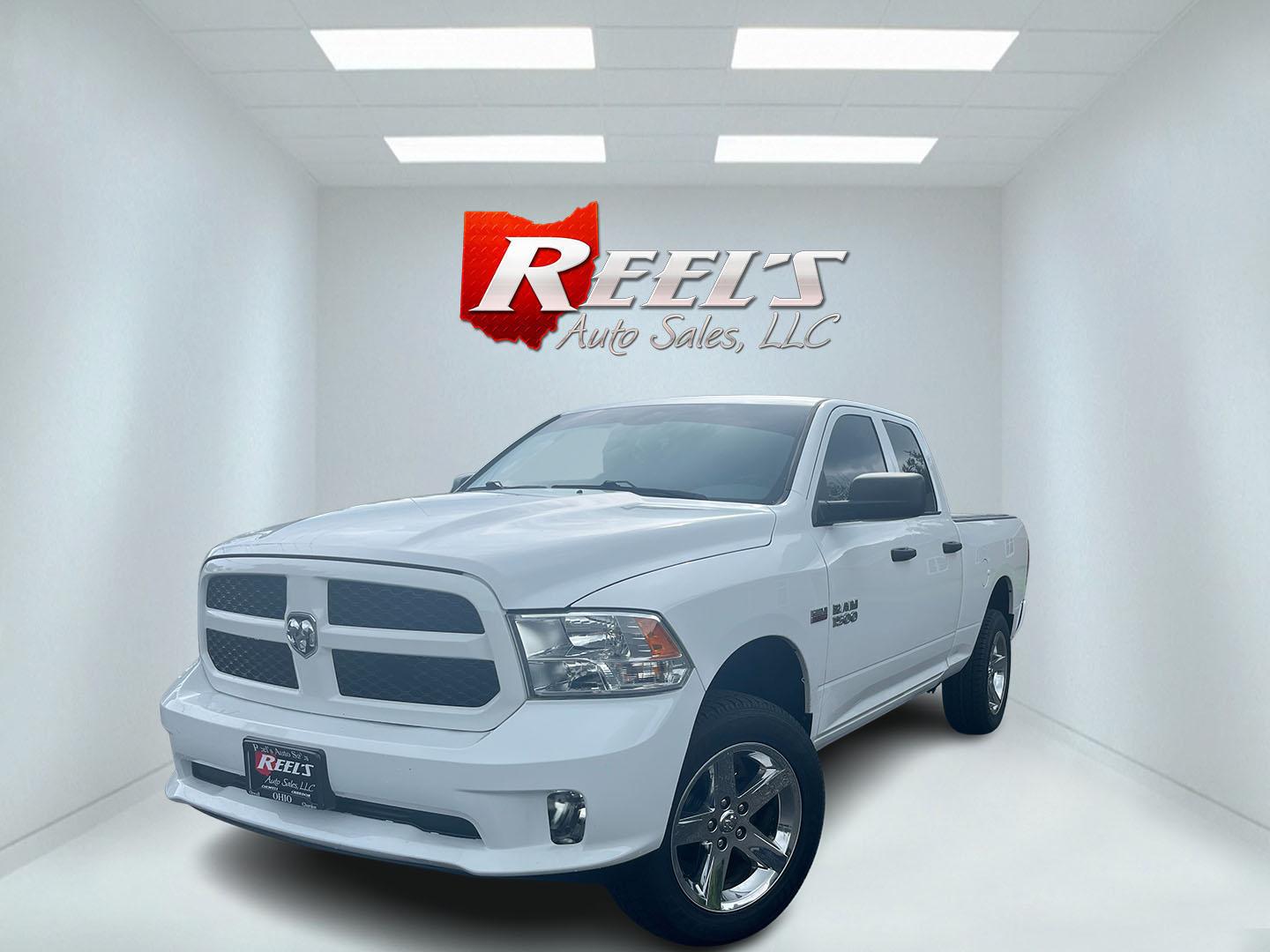 2018 White /Black RAM 1500 Express Quad Cab 4WD (1C6RR7FT2JS) with an 5.7L V8 OHV 16V engine, Automatic transmission, located at 547 E. Main St., Orwell, OH, 44076, (440) 437-5893, 41.535435, -80.847855 - 2018 Ram 1500 Express Quad Cab 4WD – HEMI Power with Fresh All Terrain Tires and Strong Towing! This 2018 Ram 1500 Express Quad Cab 4WD is a clean, capable full-size truck that’s ready for work or weekend duty. Powered by the strong 5.7L HEMI V8 engine paired with a smooth 8-speed automatic tran- Photo#0