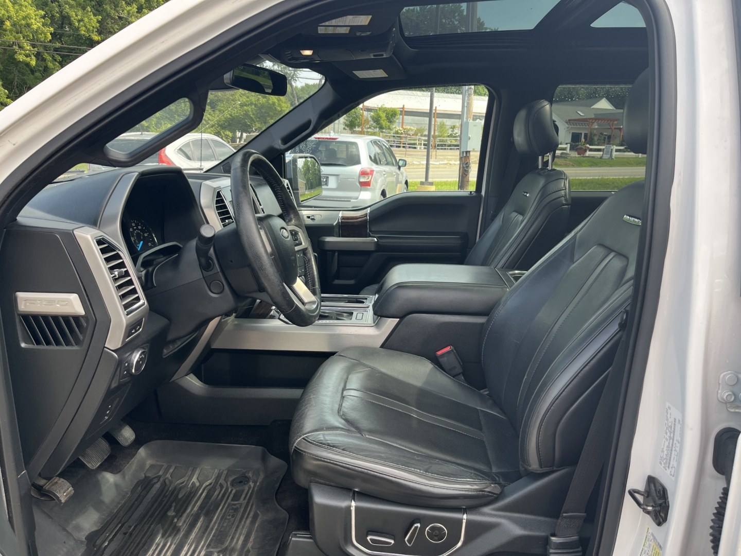 2016 White /Black Ford F-150 Platinum SuperCrew 5.5-ft. Bed 4WD (1FTEW1EG3GF) with an 3.5L V6 Twin Turbo engine, Automatic transmission, located at 11115 Chardon Rd. , Chardon, OH, 44024, (440) 214-9705, 41.580246, -81.241943 - 2016 Ford F-150 Platinum Crew Cab 4WD – Loaded Luxury Truck with Massive Towing and Fresh Timing Job! This 2016 Ford F-150 Platinum Crew Cab 4WD is a top-tier luxury truck that combines premium comfort with serious capability. Powered by the potent 3.5L Twin-Turbo EcoBoost V6 engine paired with a- Photo#17