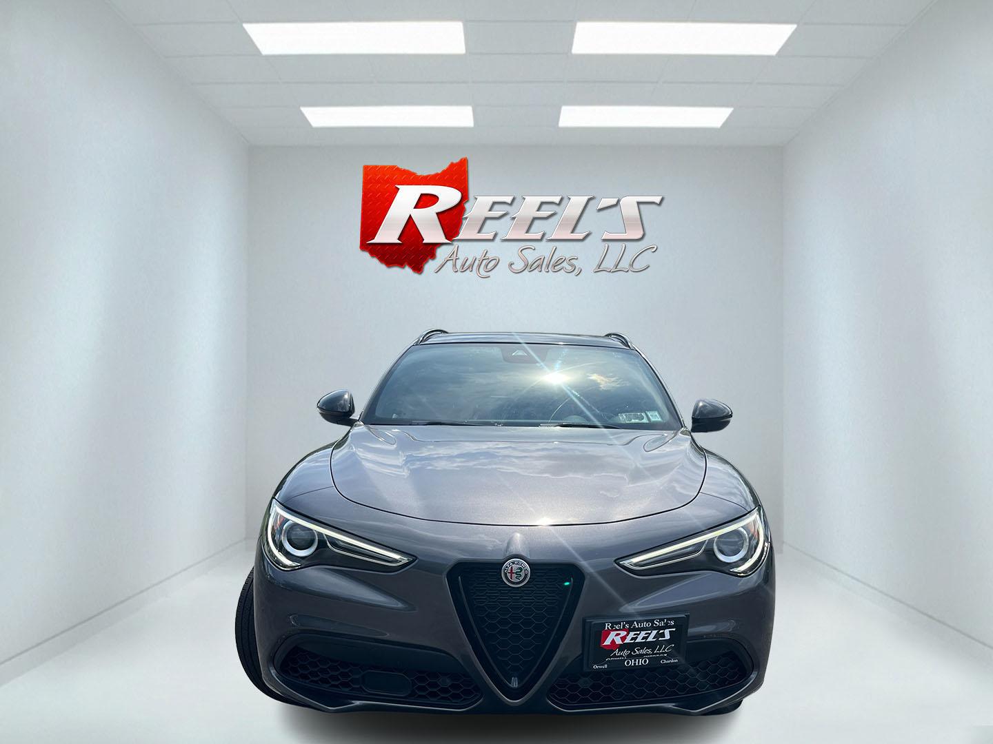 2021 Gray /Red Alfa Romeo Stelvio Ti Sport AWD (ZASPAKBN8M7) with an 2.0L I4 DOHC 16V Turbo engine, Automatic transmission, located at 11115 Chardon Rd. , Chardon, OH, 44024, (440) 214-9705, 41.580246, -81.241943 - 2021 Alfa Romeo Stelvio TI Sport AWD – Sporty Luxury SUV with Turbo Power and Premium Italian Refinement! This 2021 Alfa Romeo Stelvio TI Sport AWD is a dynamic and luxurious compact SUV that offers thrilling performance and upscale comfort. Powered by a responsive 2.0L Turbocharged I4 engine pro- Photo#1