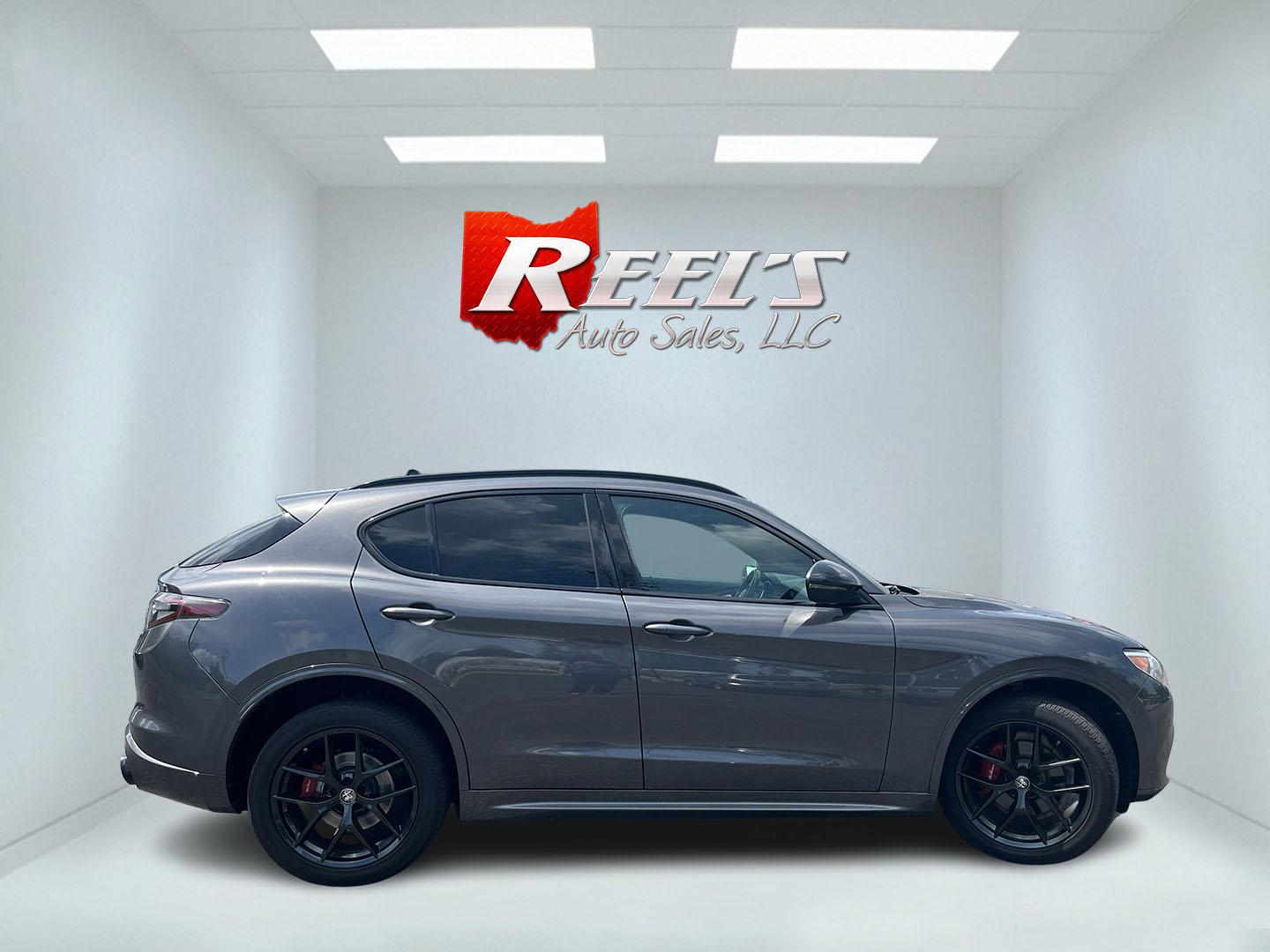 2021 Gray /Red Alfa Romeo Stelvio Ti Sport AWD (ZASPAKBN8M7) with an 2.0L I4 DOHC 16V Turbo engine, Automatic transmission, located at 11115 Chardon Rd. , Chardon, OH, 44024, (440) 214-9705, 41.580246, -81.241943 - 2021 Alfa Romeo Stelvio TI Sport AWD – Sporty Luxury SUV with Turbo Power and Premium Italian Refinement! This 2021 Alfa Romeo Stelvio TI Sport AWD is a dynamic and luxurious compact SUV that offers thrilling performance and upscale comfort. Powered by a responsive 2.0L Turbocharged I4 engine pro- Photo#5