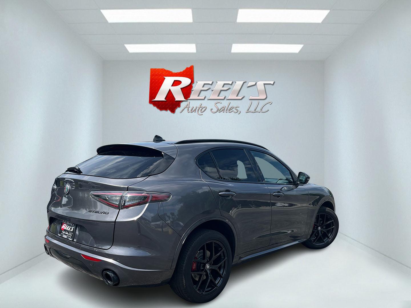 2021 Gray /Red Alfa Romeo Stelvio Ti Sport AWD (ZASPAKBN8M7) with an 2.0L I4 DOHC 16V Turbo engine, Automatic transmission, located at 11115 Chardon Rd. , Chardon, OH, 44024, (440) 214-9705, 41.580246, -81.241943 - 2021 Alfa Romeo Stelvio TI Sport AWD – Sporty Luxury SUV with Turbo Power and Premium Italian Refinement! This 2021 Alfa Romeo Stelvio TI Sport AWD is a dynamic and luxurious compact SUV that offers thrilling performance and upscale comfort. Powered by a responsive 2.0L Turbocharged I4 engine pro- Photo#6