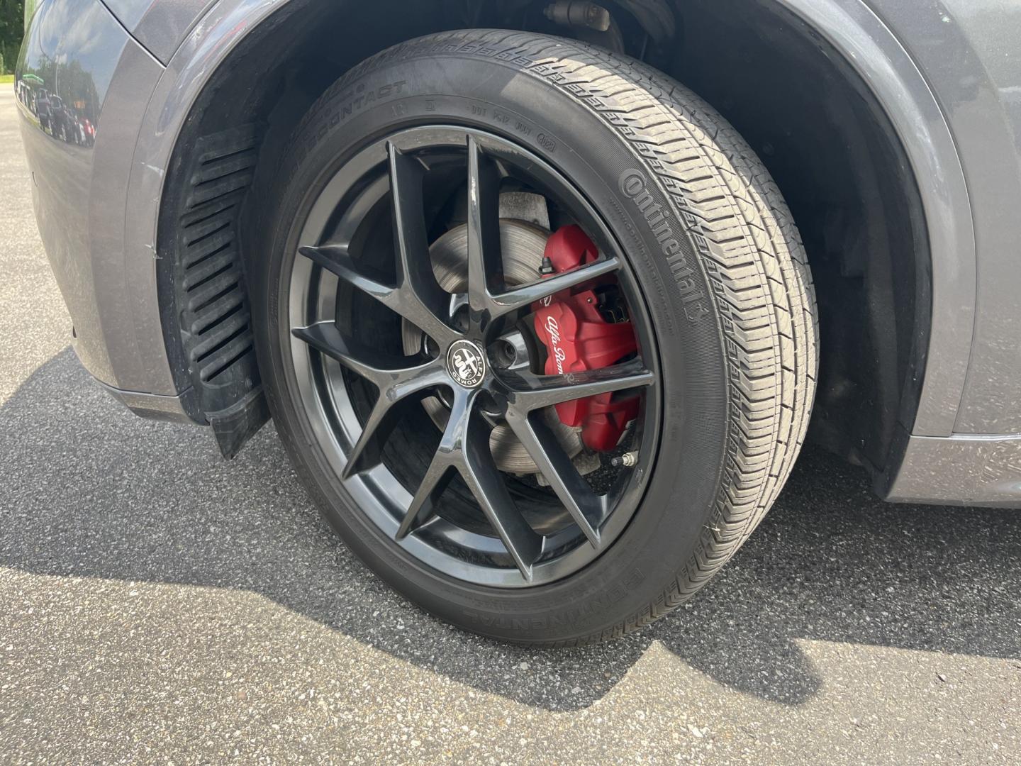 2021 Gray /Red Alfa Romeo Stelvio Ti Sport AWD (ZASPAKBN8M7) with an 2.0L I4 DOHC 16V Turbo engine, Automatic transmission, located at 11115 Chardon Rd. , Chardon, OH, 44024, (440) 214-9705, 41.580246, -81.241943 - 2021 Alfa Romeo Stelvio TI Sport AWD – Sporty Luxury SUV with Turbo Power and Premium Italian Refinement! This 2021 Alfa Romeo Stelvio TI Sport AWD is a dynamic and luxurious compact SUV that offers thrilling performance and upscale comfort. Powered by a responsive 2.0L Turbocharged I4 engine pro- Photo#12
