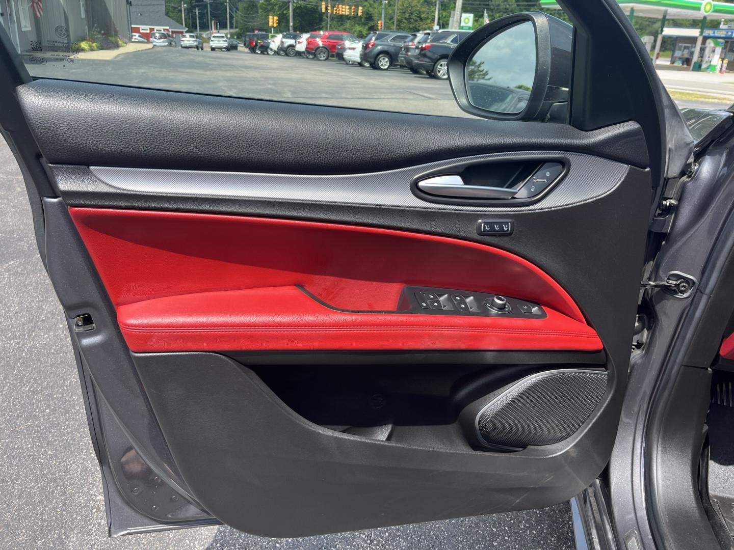2021 Gray /Red Alfa Romeo Stelvio Ti Sport AWD (ZASPAKBN8M7) with an 2.0L I4 DOHC 16V Turbo engine, Automatic transmission, located at 11115 Chardon Rd. , Chardon, OH, 44024, (440) 214-9705, 41.580246, -81.241943 - 2021 Alfa Romeo Stelvio TI Sport AWD – Sporty Luxury SUV with Turbo Power and Premium Italian Refinement! This 2021 Alfa Romeo Stelvio TI Sport AWD is a dynamic and luxurious compact SUV that offers thrilling performance and upscale comfort. Powered by a responsive 2.0L Turbocharged I4 engine pro- Photo#16
