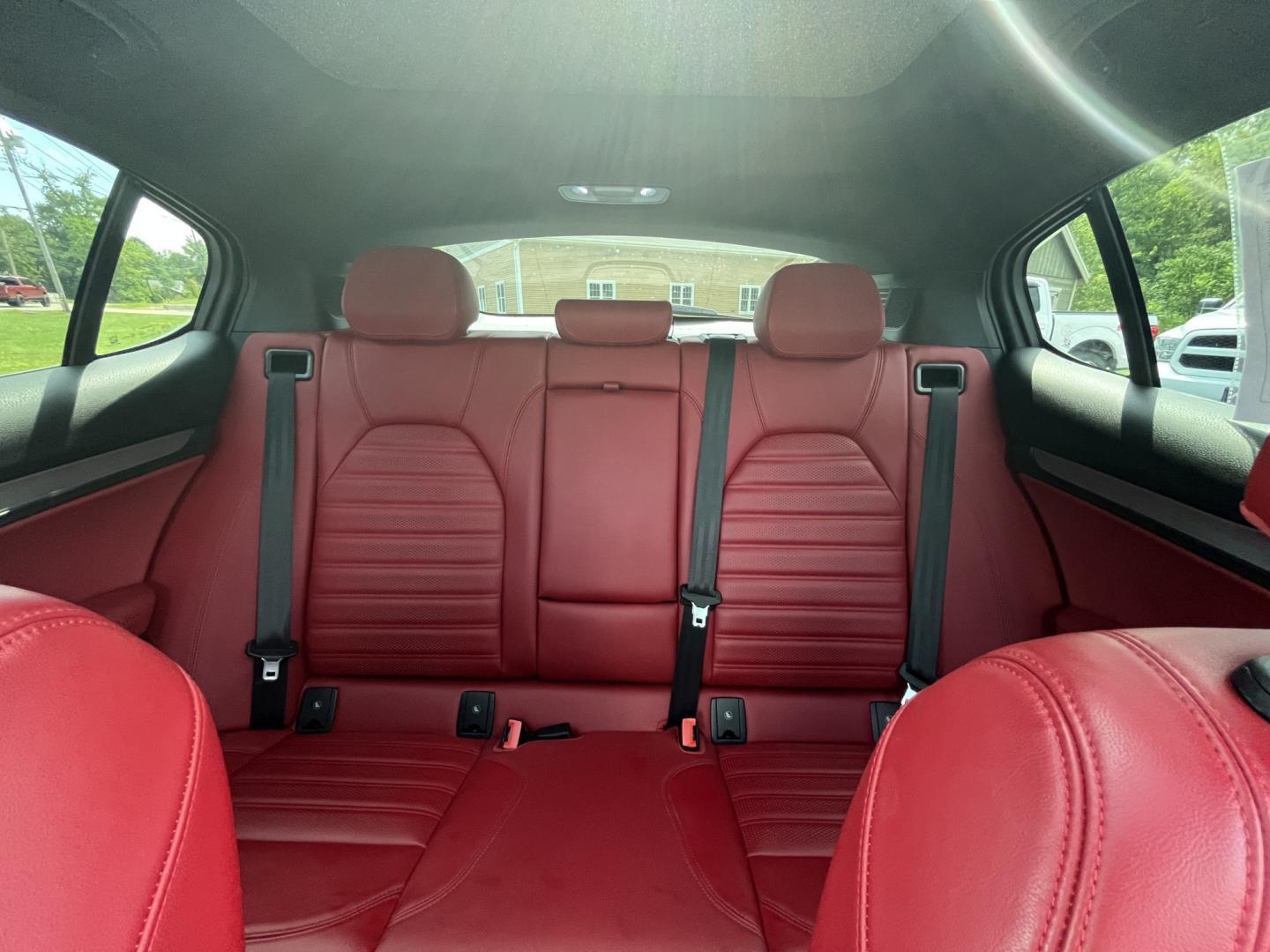 2021 Gray /Red Alfa Romeo Stelvio Ti Sport AWD (ZASPAKBN8M7) with an 2.0L I4 DOHC 16V Turbo engine, Automatic transmission, located at 11115 Chardon Rd. , Chardon, OH, 44024, (440) 214-9705, 41.580246, -81.241943 - 2021 Alfa Romeo Stelvio TI Sport AWD – Sporty Luxury SUV with Turbo Power and Premium Italian Refinement! This 2021 Alfa Romeo Stelvio TI Sport AWD is a dynamic and luxurious compact SUV that offers thrilling performance and upscale comfort. Powered by a responsive 2.0L Turbocharged I4 engine pro- Photo#28