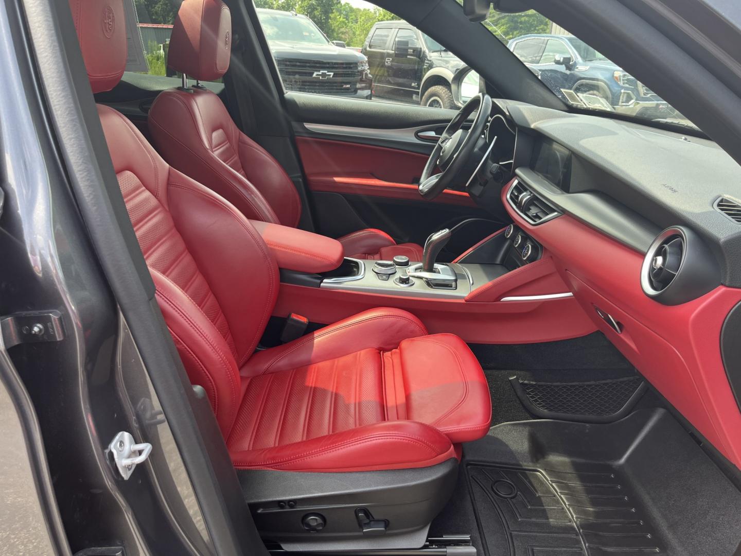2021 Gray /Red Alfa Romeo Stelvio Ti Sport AWD (ZASPAKBN8M7) with an 2.0L I4 DOHC 16V Turbo engine, Automatic transmission, located at 11115 Chardon Rd. , Chardon, OH, 44024, (440) 214-9705, 41.580246, -81.241943 - 2021 Alfa Romeo Stelvio TI Sport AWD – Sporty Luxury SUV with Turbo Power and Premium Italian Refinement! This 2021 Alfa Romeo Stelvio TI Sport AWD is a dynamic and luxurious compact SUV that offers thrilling performance and upscale comfort. Powered by a responsive 2.0L Turbocharged I4 engine pro- Photo#35