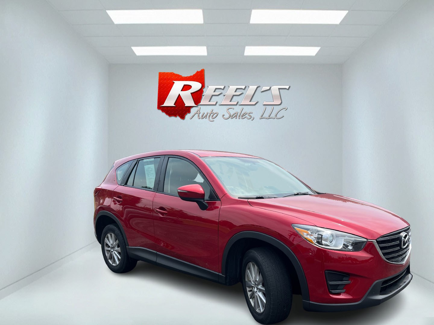 2016 Red /Black Mazda CX-5 Sport AWD (JM3KE4BY8G0) with an 2.5L I4 DOHC 16V engine, Automatic transmission, located at 11115 Chardon Rd. , Chardon, OH, 44024, (440) 214-9705, 41.580246, -81.241943 - 2016 Mazda CX-5 Sport AWD – Efficient Compact SUV with Sporty Handling and Soul Red Style! This 2016 Mazda CX-5 Sport AWD is a fun-to-drive and fuel-efficient compact crossover that offers engaging performance and everyday practicality. Powered by a smooth 2.5L I4 engine paired with a responsive- Photo#2
