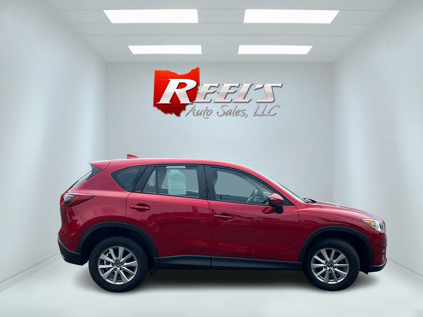 2016 Red /Black Mazda CX-5 Sport AWD (JM3KE4BY8G0) with an 2.5L I4 DOHC 16V engine, Automatic transmission, located at 11115 Chardon Rd. , Chardon, OH, 44024, (440) 214-9705, 41.580246, -81.241943 - 2016 Mazda CX-5 Sport AWD – Efficient Compact SUV with Sporty Handling and Soul Red Style! This 2016 Mazda CX-5 Sport AWD is a fun-to-drive and fuel-efficient compact crossover that offers engaging performance and everyday practicality. Powered by a smooth 2.5L I4 engine paired with a responsive- Photo#5