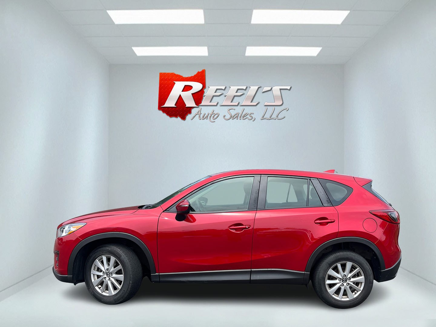 2016 Red /Black Mazda CX-5 Sport AWD (JM3KE4BY8G0) with an 2.5L I4 DOHC 16V engine, Automatic transmission, located at 11115 Chardon Rd. , Chardon, OH, 44024, (440) 214-9705, 41.580246, -81.241943 - 2016 Mazda CX-5 Sport AWD – Efficient Compact SUV with Sporty Handling and Soul Red Style! This 2016 Mazda CX-5 Sport AWD is a fun-to-drive and fuel-efficient compact crossover that offers engaging performance and everyday practicality. Powered by a smooth 2.5L I4 engine paired with a responsive- Photo#11