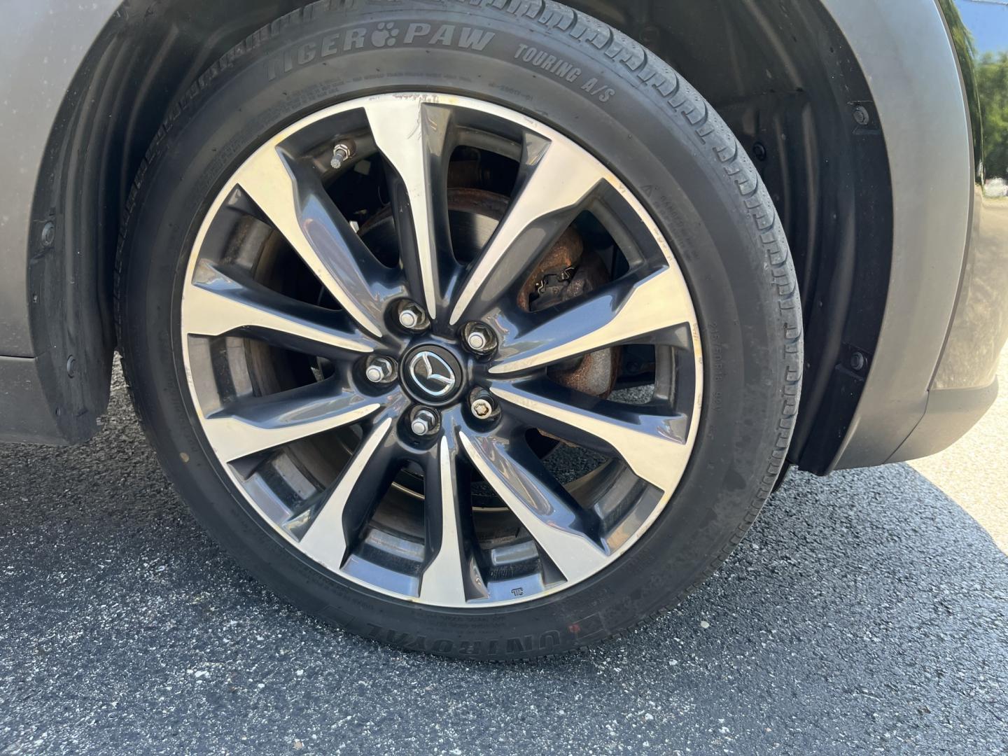 2019 Black /Black Mazda CX-3 Touring AWD (JM1DKFC71K1) with an 2.0L I4 DOHC 16V engine, Automatic transmission, located at 11115 Chardon Rd. , Chardon, OH, 44024, (440) 214-9705, 41.580246, -81.241943 - 2019 Mazda CX-3 Touring AWD – Sporty Compact Crossover with Premium Features and Strong Efficiency! This 2019 Mazda CX-3 Touring AWD is a fun-to-drive and stylish compact SUV that offers engaging performance and upscale comfort. Powered by a responsive 2.0L I4 engine paired with a smooth 6-speed- Photo#4