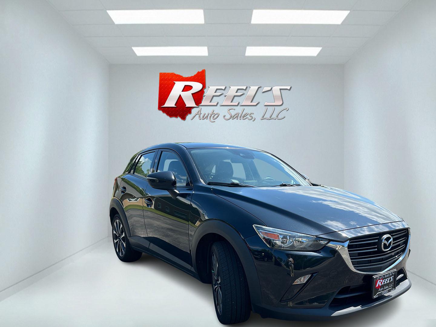 2019 Black /Black Mazda CX-3 Touring AWD (JM1DKFC71K1) with an 2.0L I4 DOHC 16V engine, Automatic transmission, located at 11115 Chardon Rd. , Chardon, OH, 44024, (440) 214-9705, 41.580246, -81.241943 - 2019 Mazda CX-3 Touring AWD – Sporty Compact Crossover with Premium Features and Strong Efficiency! This 2019 Mazda CX-3 Touring AWD is a fun-to-drive and stylish compact SUV that offers engaging performance and upscale comfort. Powered by a responsive 2.0L I4 engine paired with a smooth 6-speed- Photo#2