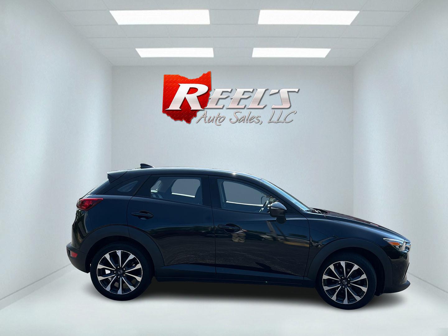 2019 Black /Black Mazda CX-3 Touring AWD (JM1DKFC71K1) with an 2.0L I4 DOHC 16V engine, Automatic transmission, located at 11115 Chardon Rd. , Chardon, OH, 44024, (440) 214-9705, 41.580246, -81.241943 - 2019 Mazda CX-3 Touring AWD – Sporty Compact Crossover with Premium Features and Strong Efficiency! This 2019 Mazda CX-3 Touring AWD is a fun-to-drive and stylish compact SUV that offers engaging performance and upscale comfort. Powered by a responsive 2.0L I4 engine paired with a smooth 6-speed- Photo#5
