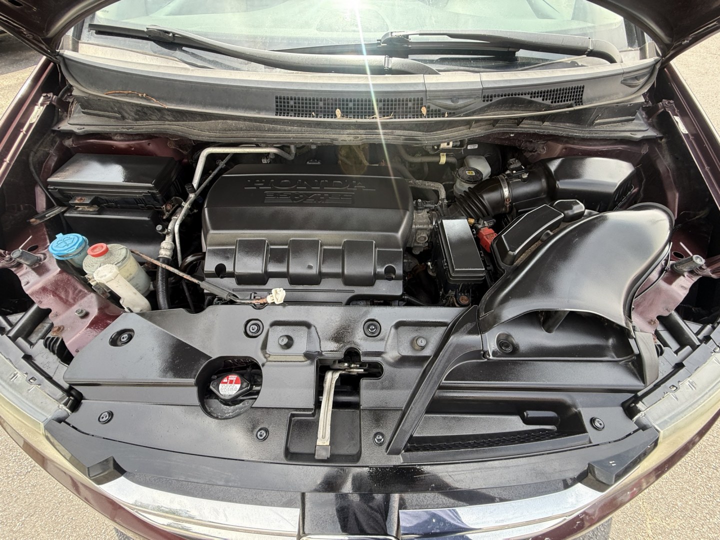 2014 Red /Tan Honda Odyssey LX (5FNRL5H28EB) with an 3.5L V6 SOHC 24V engine, Automatic transmission, located at 547 E. Main St., Orwell, OH, 44076, (440) 437-5893, 41.535435, -80.847855 - 2014 Honda Odyssey LX – Spacious Family Minivan with Fresh Tires and Reliable V6 Power! This 2014 Honda Odyssey LX is a practical and family-friendly minivan that offers generous space and dependable performance. Powered by a smooth 3.5L V6 engine paired with a responsive 6-speed automatic transm- Photo#6