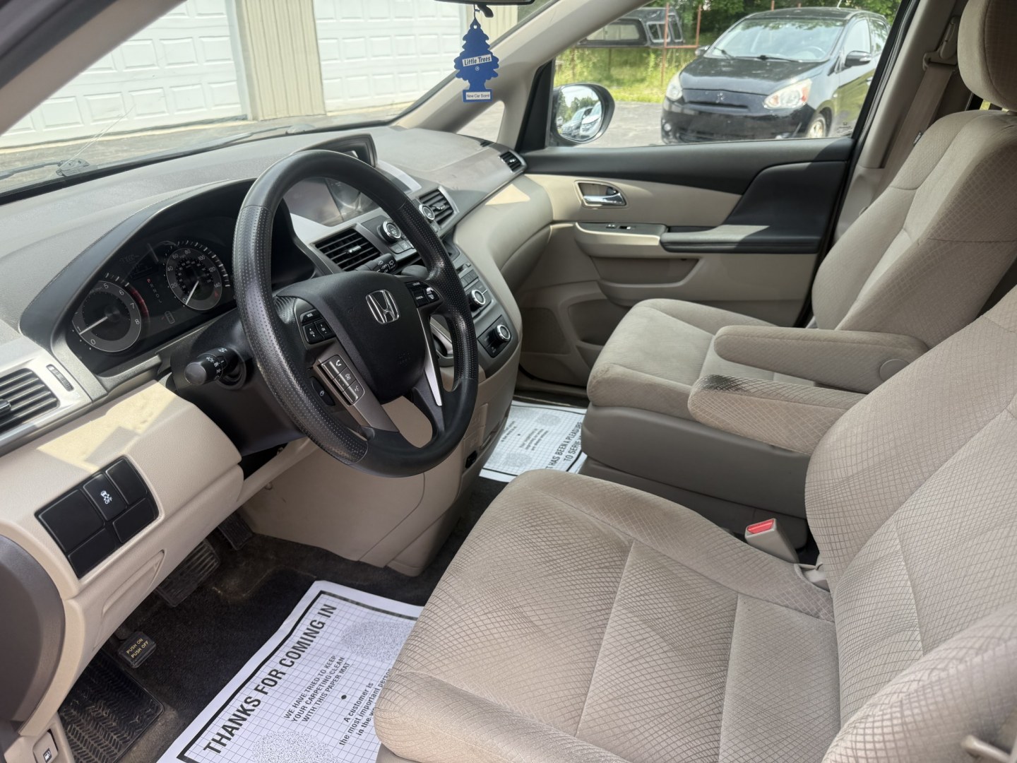 2014 Red /Tan Honda Odyssey LX (5FNRL5H28EB) with an 3.5L V6 SOHC 24V engine, Automatic transmission, located at 547 E. Main St., Orwell, OH, 44076, (440) 437-5893, 41.535435, -80.847855 - 2014 Honda Odyssey LX – Spacious Family Minivan with Fresh Tires and Reliable V6 Power! This 2014 Honda Odyssey LX is a practical and family-friendly minivan that offers generous space and dependable performance. Powered by a smooth 3.5L V6 engine paired with a responsive 6-speed automatic transm- Photo#9