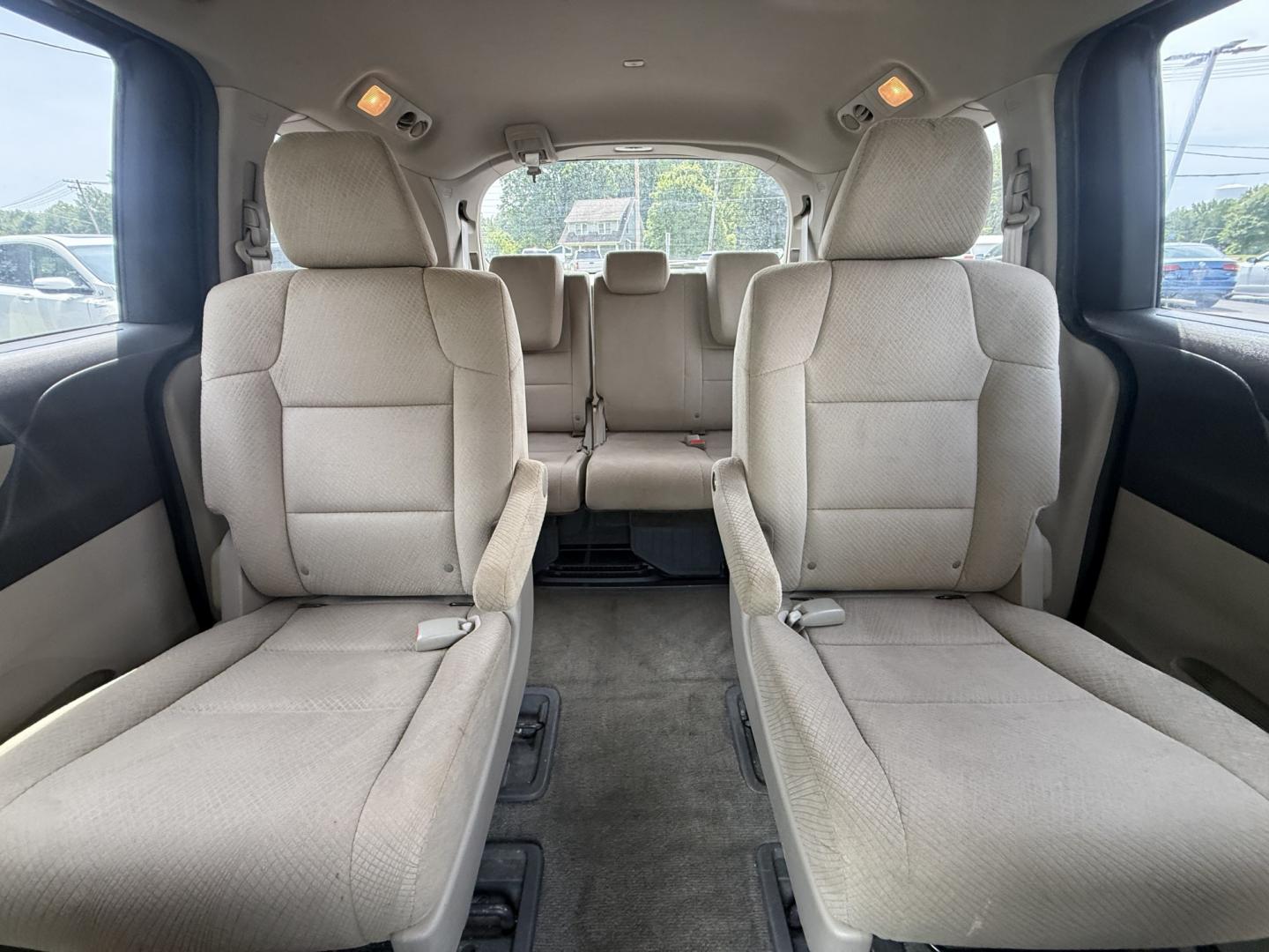 2014 Red /Tan Honda Odyssey LX (5FNRL5H28EB) with an 3.5L V6 SOHC 24V engine, Automatic transmission, located at 547 E. Main St., Orwell, OH, 44076, (440) 437-5893, 41.535435, -80.847855 - 2014 Honda Odyssey LX – Spacious Family Minivan with Fresh Tires and Reliable V6 Power! This 2014 Honda Odyssey LX is a practical and family-friendly minivan that offers generous space and dependable performance. Powered by a smooth 3.5L V6 engine paired with a responsive 6-speed automatic transm- Photo#19