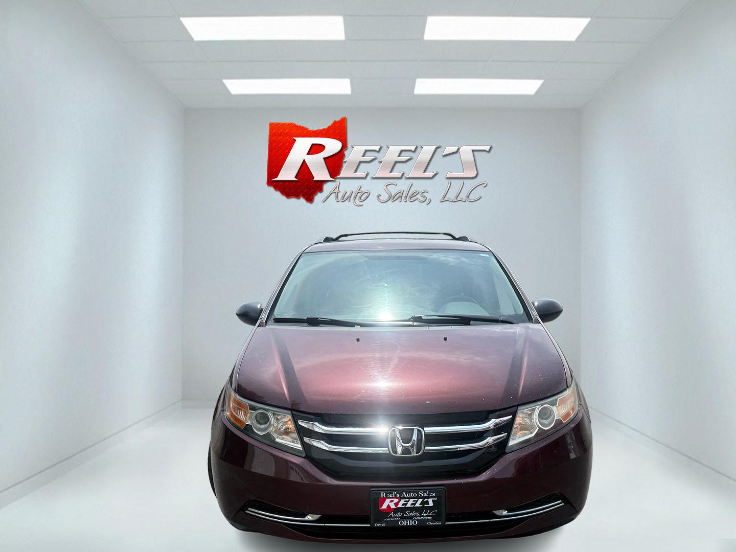 2014 Red /Tan Honda Odyssey LX (5FNRL5H28EB) with an 3.5L V6 SOHC 24V engine, Automatic transmission, located at 547 E. Main St., Orwell, OH, 44076, (440) 437-5893, 41.535435, -80.847855 - 2014 Honda Odyssey LX – Spacious Family Minivan with Fresh Tires and Reliable V6 Power! This 2014 Honda Odyssey LX is a practical and family-friendly minivan that offers generous space and dependable performance. Powered by a smooth 3.5L V6 engine paired with a responsive 6-speed automatic transm- Photo#1
