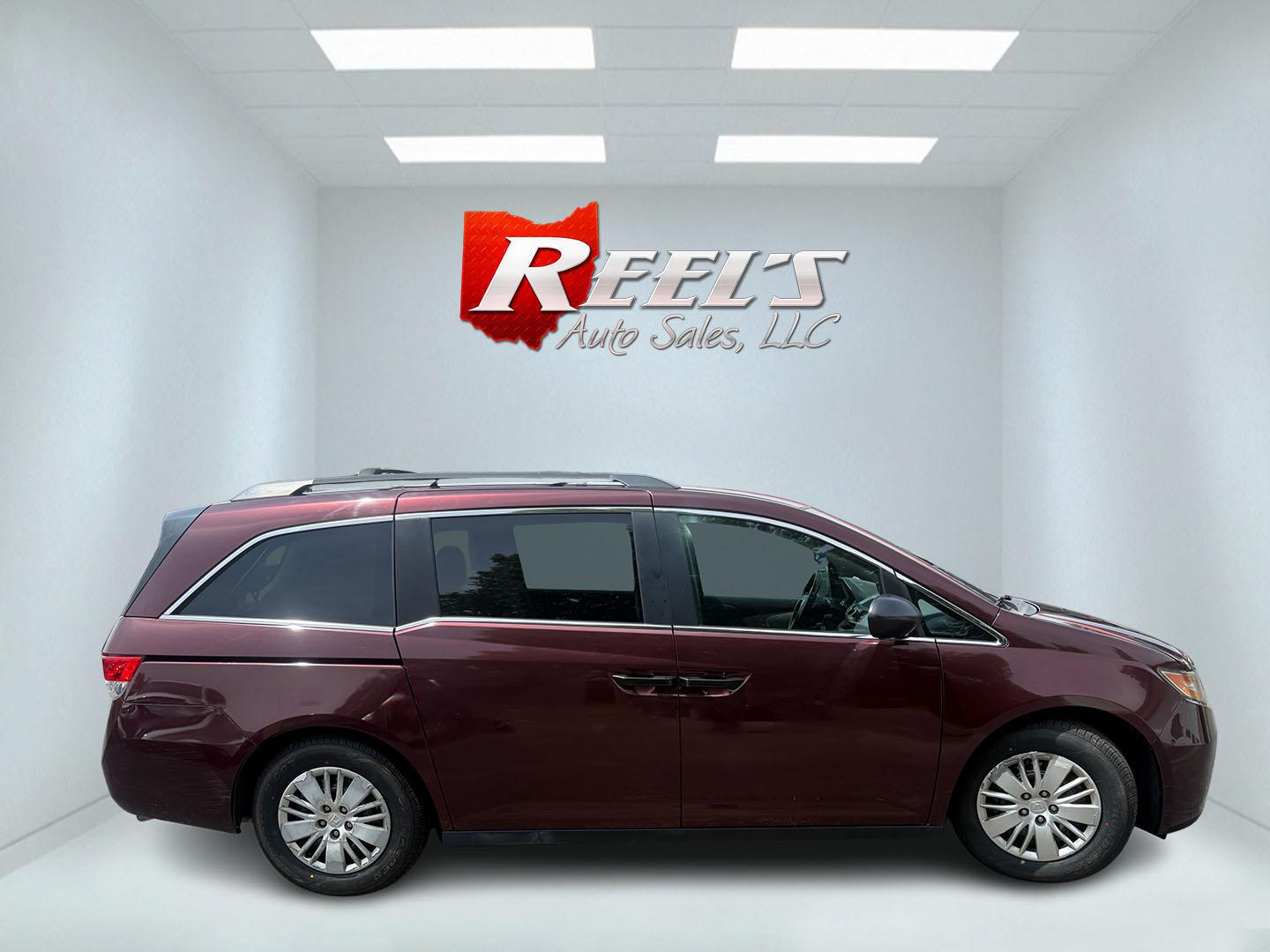 2014 Red /Tan Honda Odyssey LX (5FNRL5H28EB) with an 3.5L V6 SOHC 24V engine, Automatic transmission, located at 547 E. Main St., Orwell, OH, 44076, (440) 437-5893, 41.535435, -80.847855 - 2014 Honda Odyssey LX – Spacious Family Minivan with Fresh Tires and Reliable V6 Power! This 2014 Honda Odyssey LX is a practical and family-friendly minivan that offers generous space and dependable performance. Powered by a smooth 3.5L V6 engine paired with a responsive 6-speed automatic transm- Photo#23