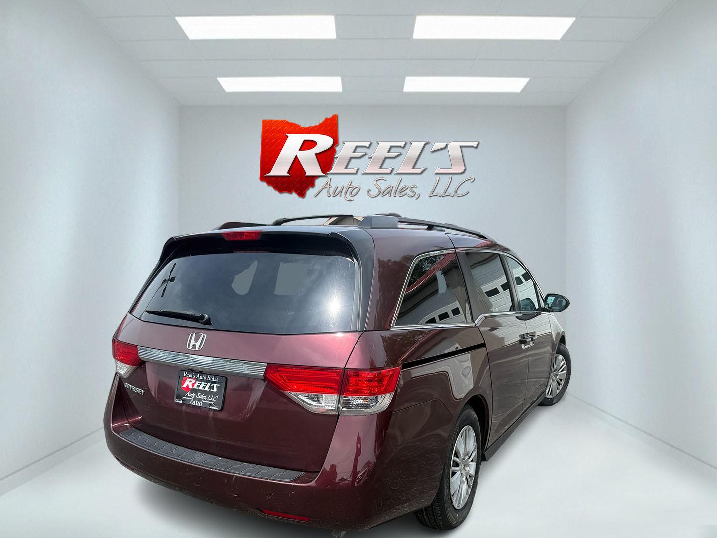2014 Red /Tan Honda Odyssey LX (5FNRL5H28EB) with an 3.5L V6 SOHC 24V engine, Automatic transmission, located at 547 E. Main St., Orwell, OH, 44076, (440) 437-5893, 41.535435, -80.847855 - 2014 Honda Odyssey LX – Spacious Family Minivan with Fresh Tires and Reliable V6 Power! This 2014 Honda Odyssey LX is a practical and family-friendly minivan that offers generous space and dependable performance. Powered by a smooth 3.5L V6 engine paired with a responsive 6-speed automatic transm- Photo#25