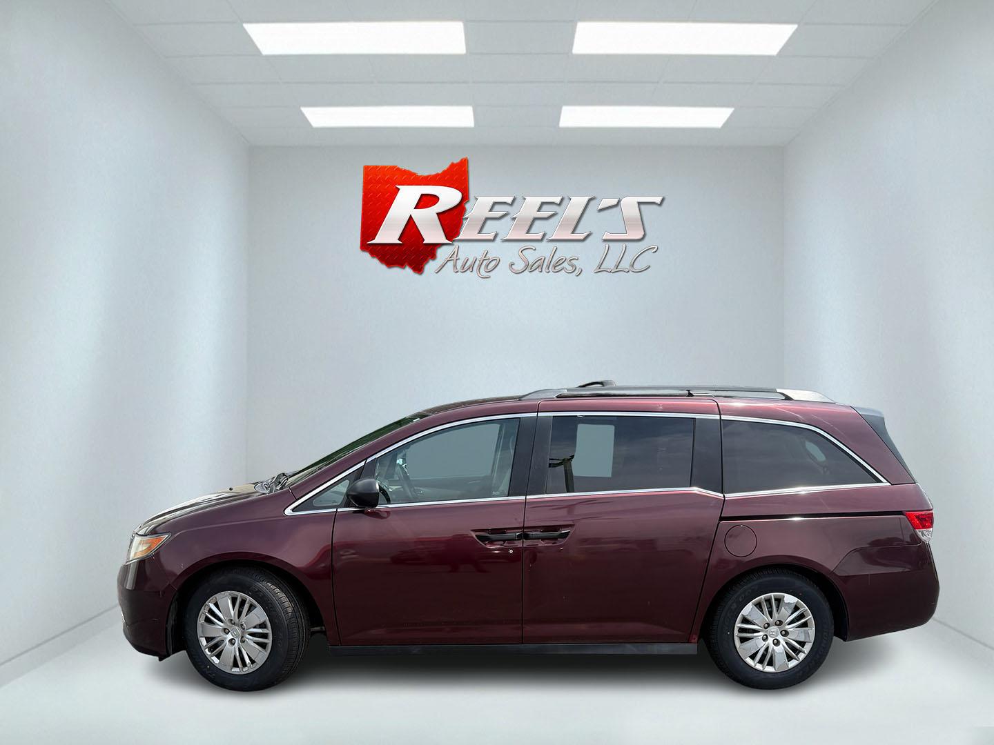 2014 Red /Tan Honda Odyssey LX (5FNRL5H28EB) with an 3.5L V6 SOHC 24V engine, Automatic transmission, located at 547 E. Main St., Orwell, OH, 44076, (440) 437-5893, 41.535435, -80.847855 - 2014 Honda Odyssey LX – Spacious Family Minivan with Fresh Tires and Reliable V6 Power! This 2014 Honda Odyssey LX is a practical and family-friendly minivan that offers generous space and dependable performance. Powered by a smooth 3.5L V6 engine paired with a responsive 6-speed automatic transm- Photo#30