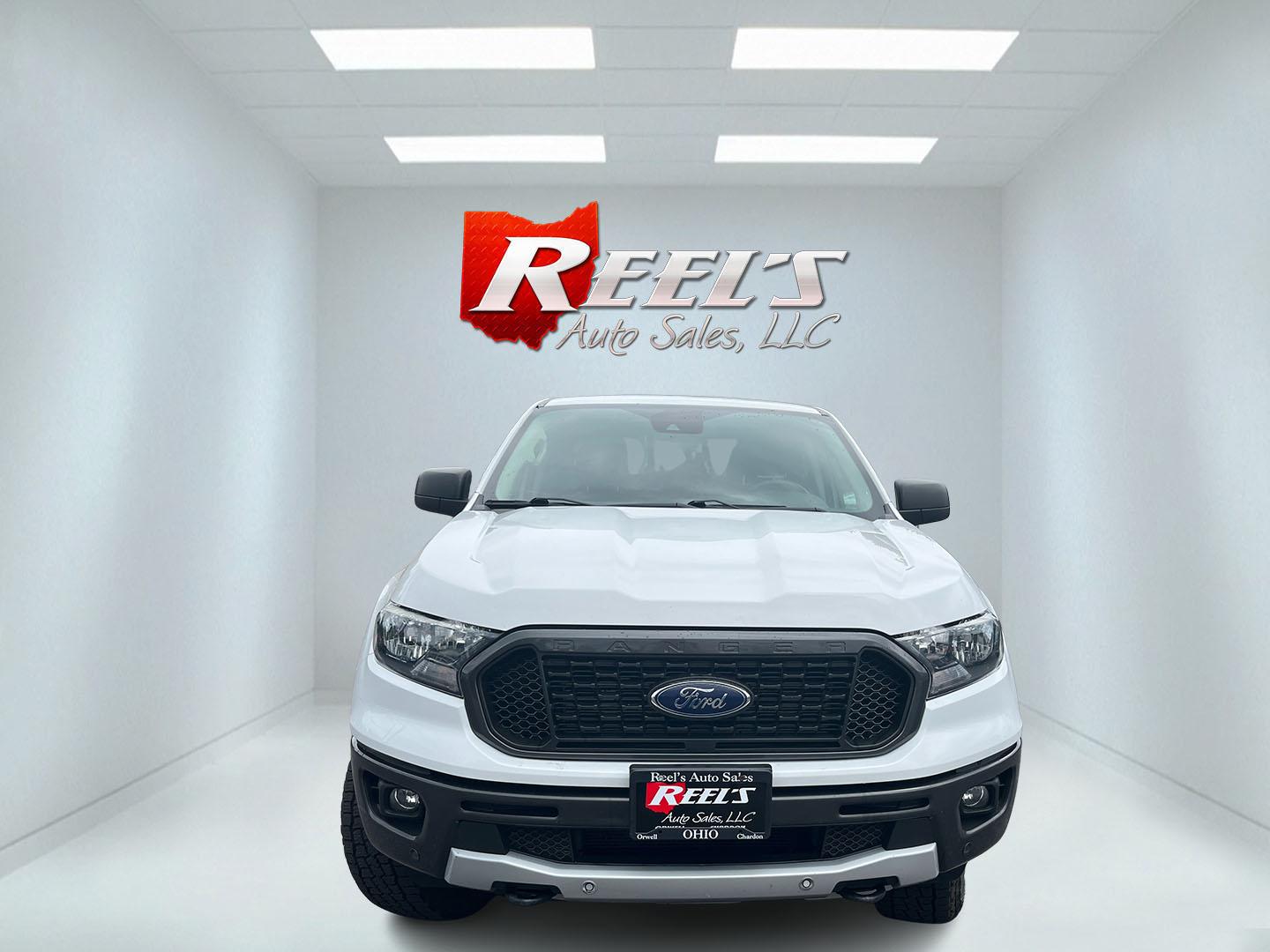 2019 White /Black Ford Ranger XLT SuperCrew 4WD (1FTER4FH5KL) with an 2.3L I4 DOHC 16V Turbo engine, Automatic transmission, located at 11115 Chardon Rd. , Chardon, OH, 44024, (440) 214-9705, 41.580246, -81.241943 - 2019 Ford Ranger XLT Crew Cab 4WD – Sporty Turbo Pickup with Off-Road Capability and Modern Safety! This 2019 Ford Ranger XLT Crew Cab 4WD is a capable and well-equipped midsize truck that offers strong performance and modern features. Powered by a responsive 2.3L Turbocharged EcoBoost I4 engine- Photo#1