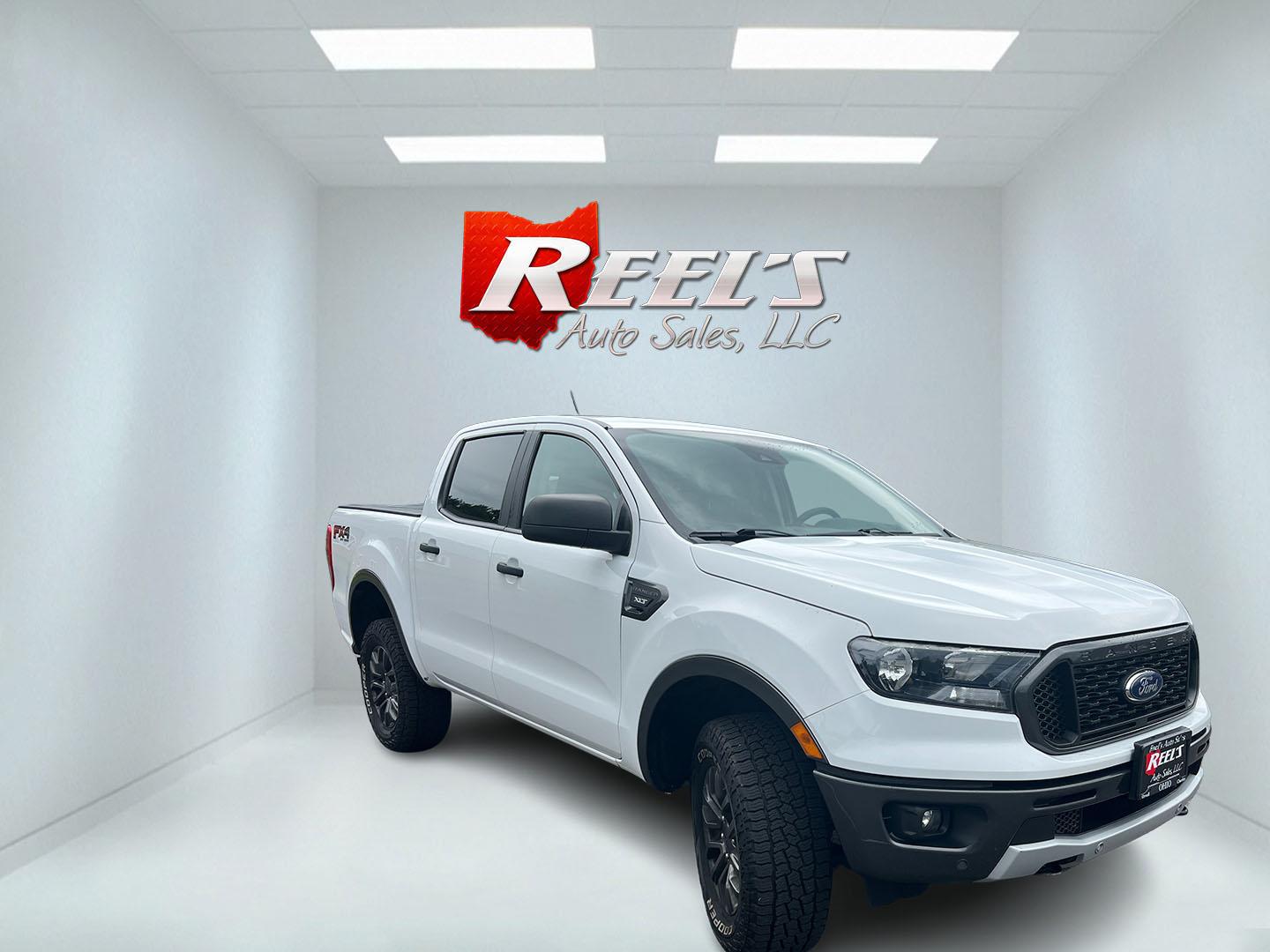2019 White /Black Ford Ranger XLT SuperCrew 4WD (1FTER4FH5KL) with an 2.3L I4 DOHC 16V Turbo engine, Automatic transmission, located at 11115 Chardon Rd. , Chardon, OH, 44024, (440) 214-9705, 41.580246, -81.241943 - 2019 Ford Ranger XLT Crew Cab 4WD – Sporty Turbo Pickup with Off-Road Capability and Modern Safety! This 2019 Ford Ranger XLT Crew Cab 4WD is a capable and well-equipped midsize truck that offers strong performance and modern features. Powered by a responsive 2.3L Turbocharged EcoBoost I4 engine- Photo#2