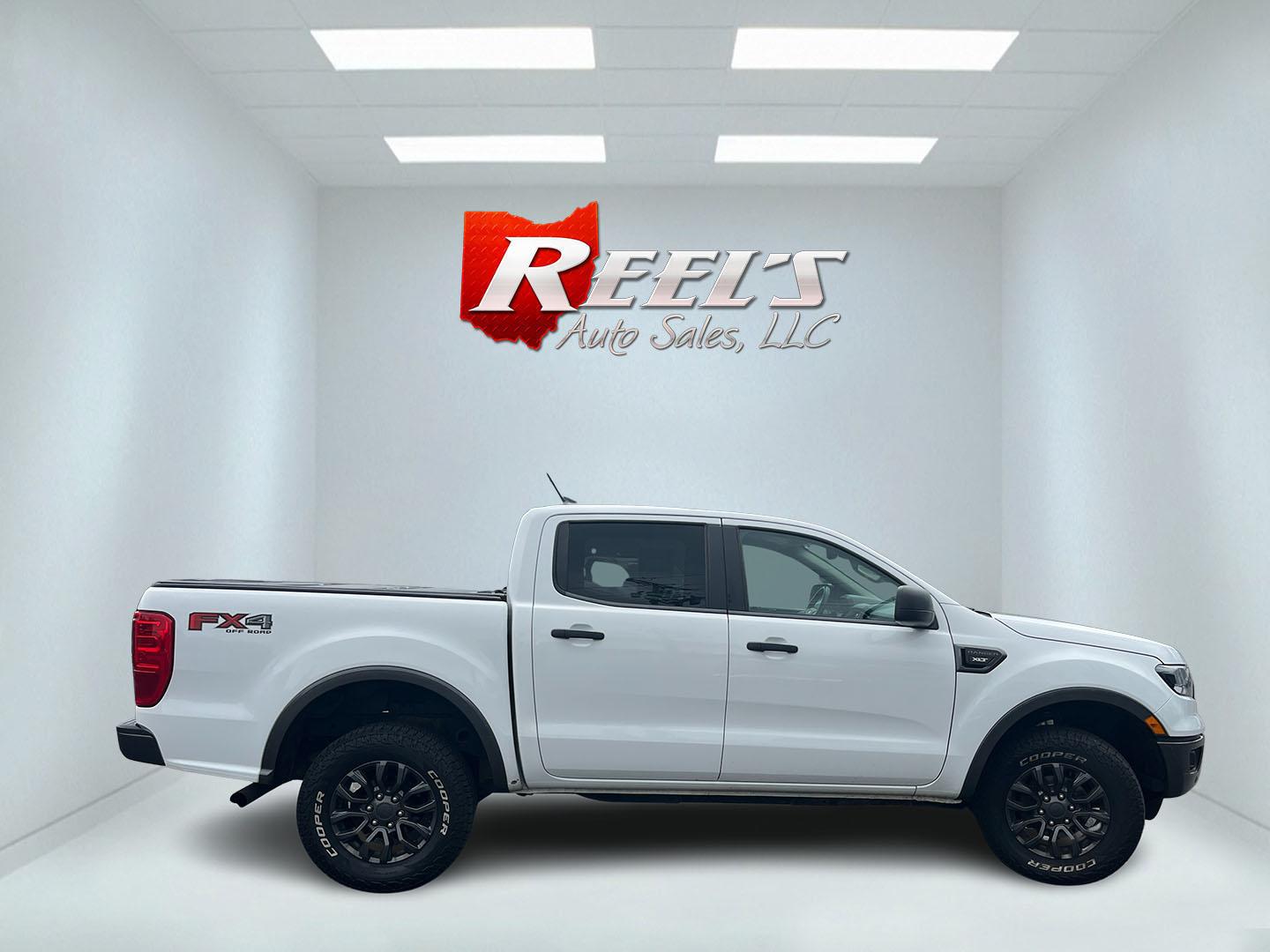 2019 White /Black Ford Ranger XLT SuperCrew 4WD (1FTER4FH5KL) with an 2.3L I4 DOHC 16V Turbo engine, Automatic transmission, located at 11115 Chardon Rd. , Chardon, OH, 44024, (440) 214-9705, 41.580246, -81.241943 - 2019 Ford Ranger XLT Crew Cab 4WD – Sporty Turbo Pickup with Off-Road Capability and Modern Safety! This 2019 Ford Ranger XLT Crew Cab 4WD is a capable and well-equipped midsize truck that offers strong performance and modern features. Powered by a responsive 2.3L Turbocharged EcoBoost I4 engine- Photo#5