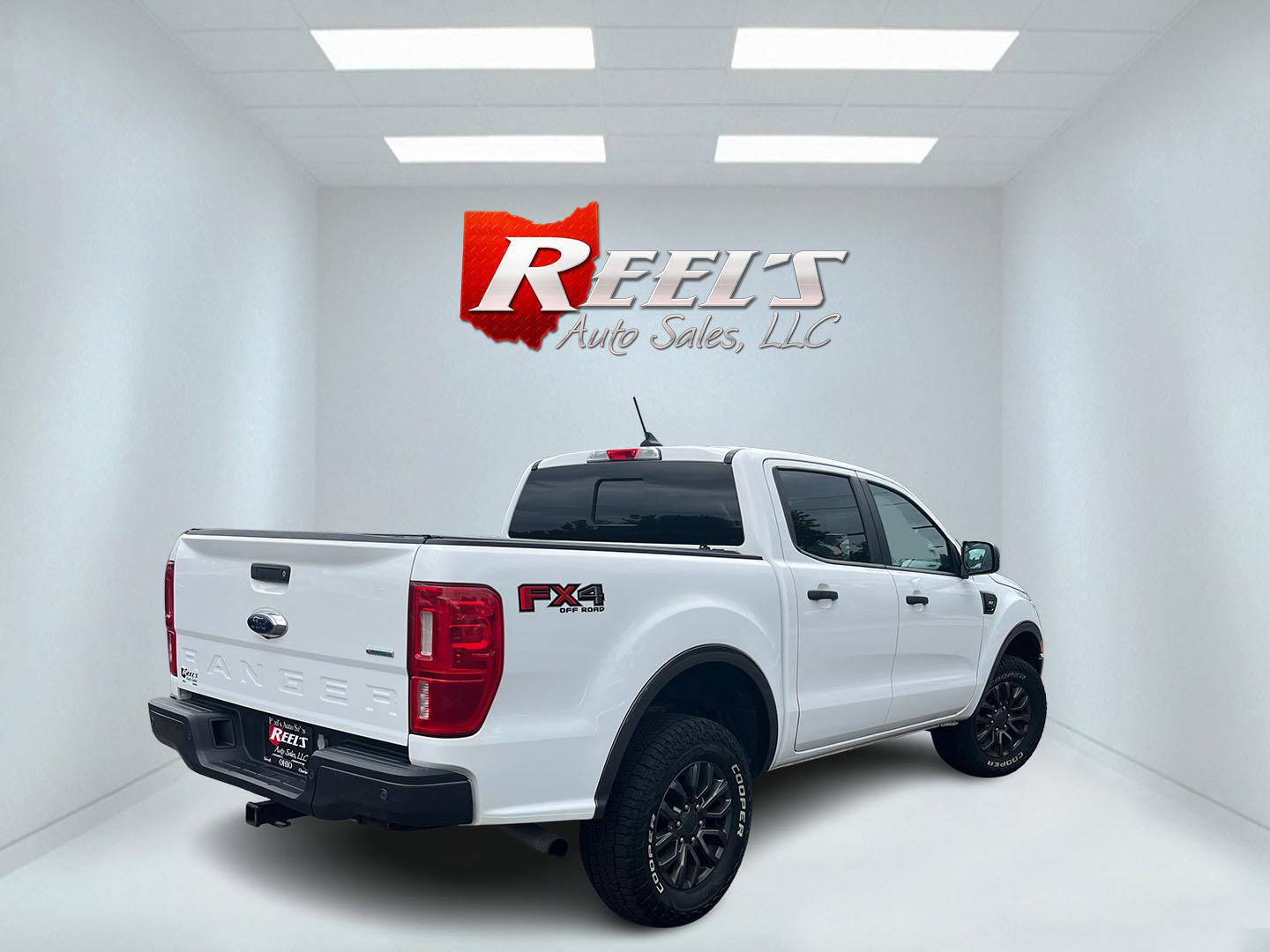 2019 White /Black Ford Ranger XLT SuperCrew 4WD (1FTER4FH5KL) with an 2.3L I4 DOHC 16V Turbo engine, Automatic transmission, located at 11115 Chardon Rd. , Chardon, OH, 44024, (440) 214-9705, 41.580246, -81.241943 - 2019 Ford Ranger XLT Crew Cab 4WD – Sporty Turbo Pickup with Off-Road Capability and Modern Safety! This 2019 Ford Ranger XLT Crew Cab 4WD is a capable and well-equipped midsize truck that offers strong performance and modern features. Powered by a responsive 2.3L Turbocharged EcoBoost I4 engine- Photo#6