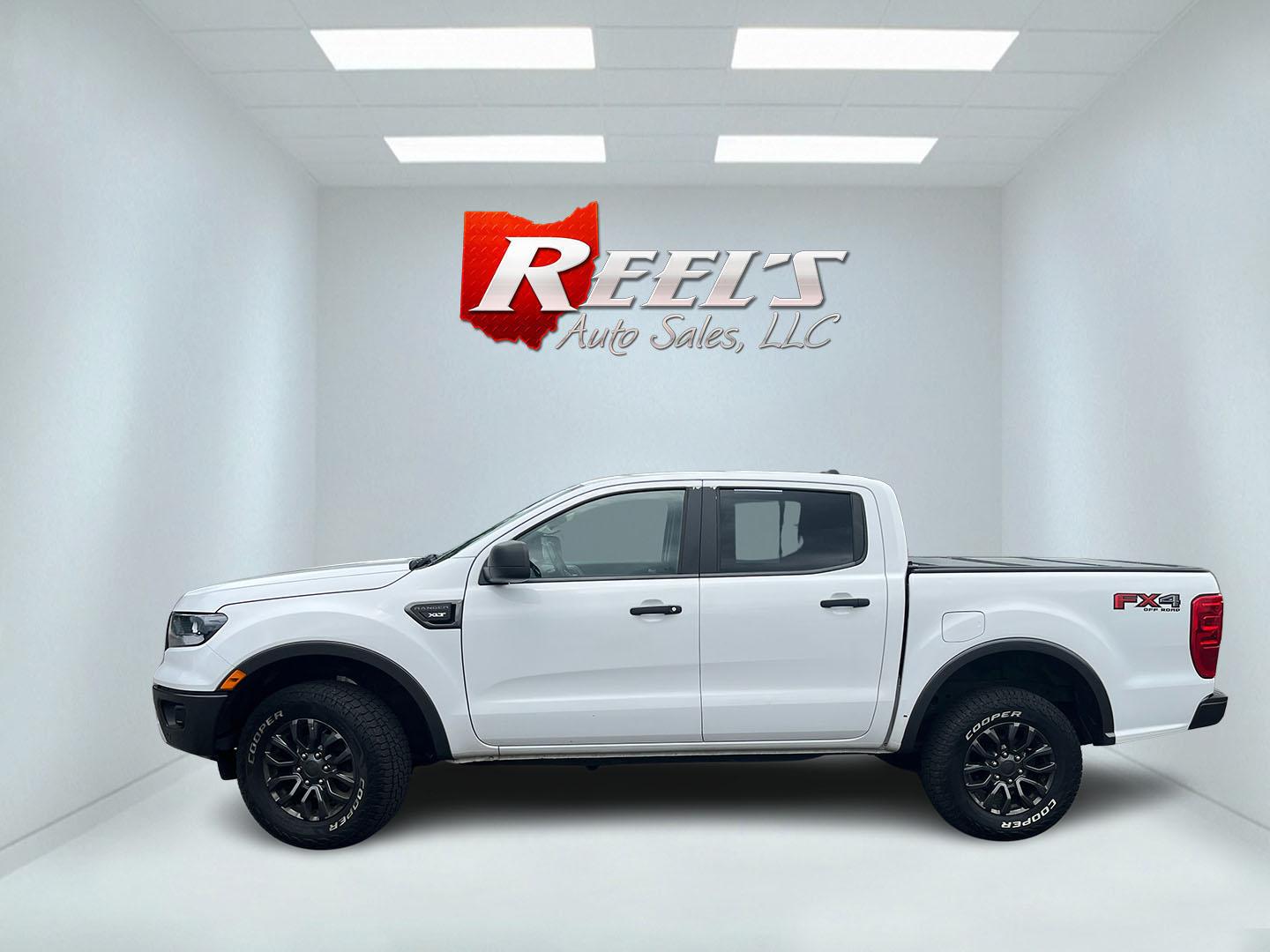 2019 White /Black Ford Ranger XLT SuperCrew 4WD (1FTER4FH5KL) with an 2.3L I4 DOHC 16V Turbo engine, Automatic transmission, located at 11115 Chardon Rd. , Chardon, OH, 44024, (440) 214-9705, 41.580246, -81.241943 - 2019 Ford Ranger XLT Crew Cab 4WD – Sporty Turbo Pickup with Off-Road Capability and Modern Safety! This 2019 Ford Ranger XLT Crew Cab 4WD is a capable and well-equipped midsize truck that offers strong performance and modern features. Powered by a responsive 2.3L Turbocharged EcoBoost I4 engine- Photo#11