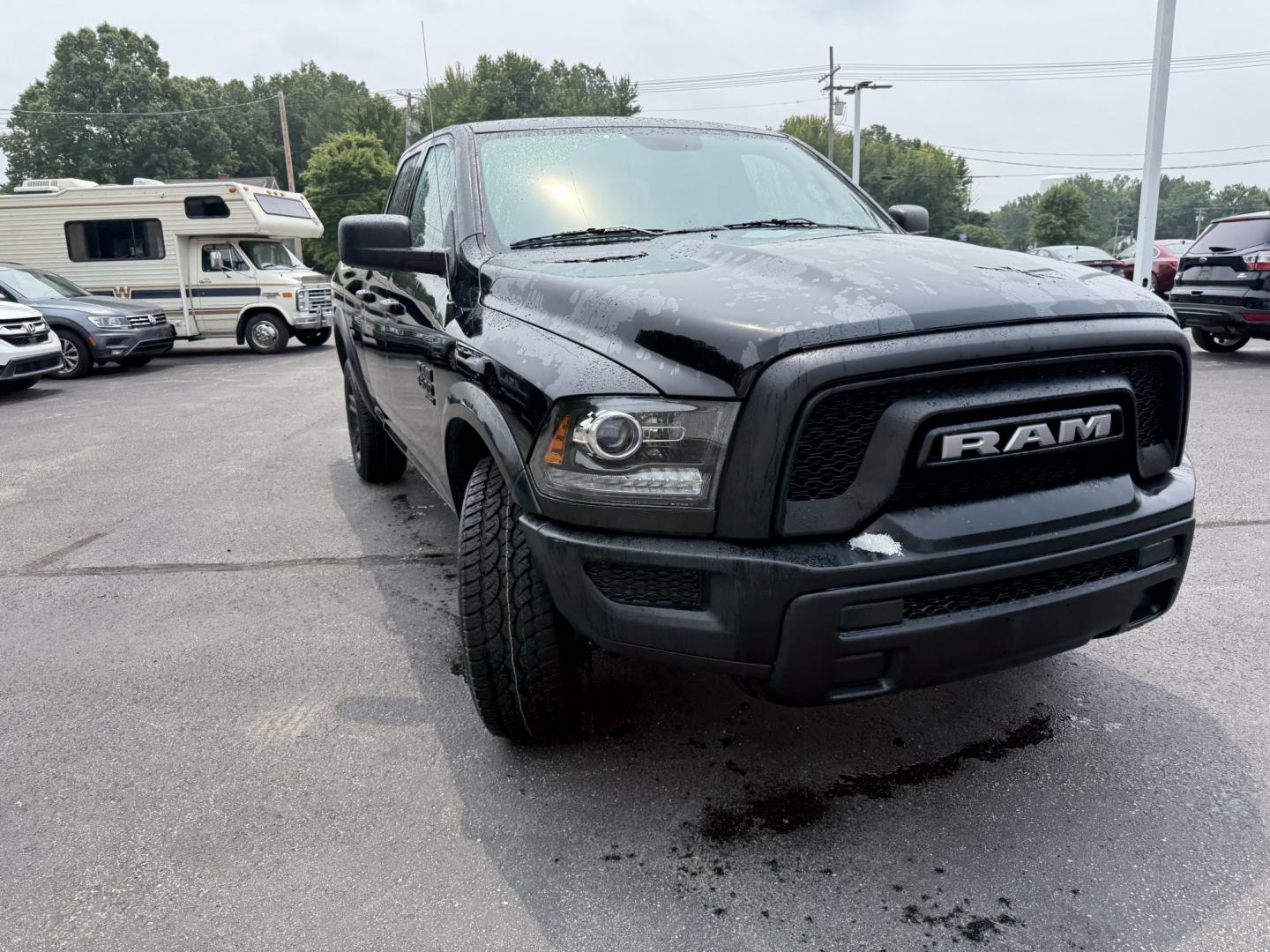 2021 Black /Black RAM 1500 Warlock Quad Cab 4WD (1C6RR7GG8MS) with an 3.6L V6 DOHC 24V engine, Automatic transmission, located at 547 E. Main St., Orwell, OH, 44076, (440) 437-5893, 41.535435, -80.847855 - 2021 Ram 1500 Classic Warlock Quad Cab 4WD – Rugged Style with Fresh All-Terrain Tires and Modern Tech! This 2021 Ram 1500 Classic Warlock Quad Cab 4WD is a bold, capable full-size truck that offers strong performance and modern convenience. Powered by a smooth 3.6L Pentastar V6 engine paired wit- Photo#2