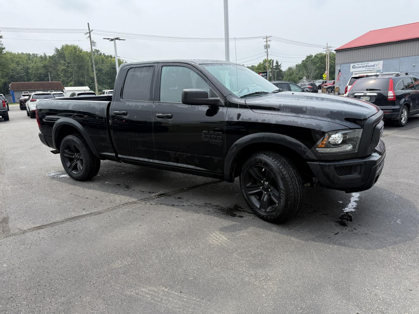 2021 Black /Black RAM 1500 Warlock Quad Cab 4WD (1C6RR7GG8MS) with an 3.6L V6 DOHC 24V engine, Automatic transmission, located at 547 E. Main St., Orwell, OH, 44076, (440) 437-5893, 41.535435, -80.847855 - 2021 Ram 1500 Classic Warlock Quad Cab 4WD – Rugged Style with Fresh All-Terrain Tires and Modern Tech! This 2021 Ram 1500 Classic Warlock Quad Cab 4WD is a bold, capable full-size truck that offers strong performance and modern convenience. Powered by a smooth 3.6L Pentastar V6 engine paired wit- Photo#3