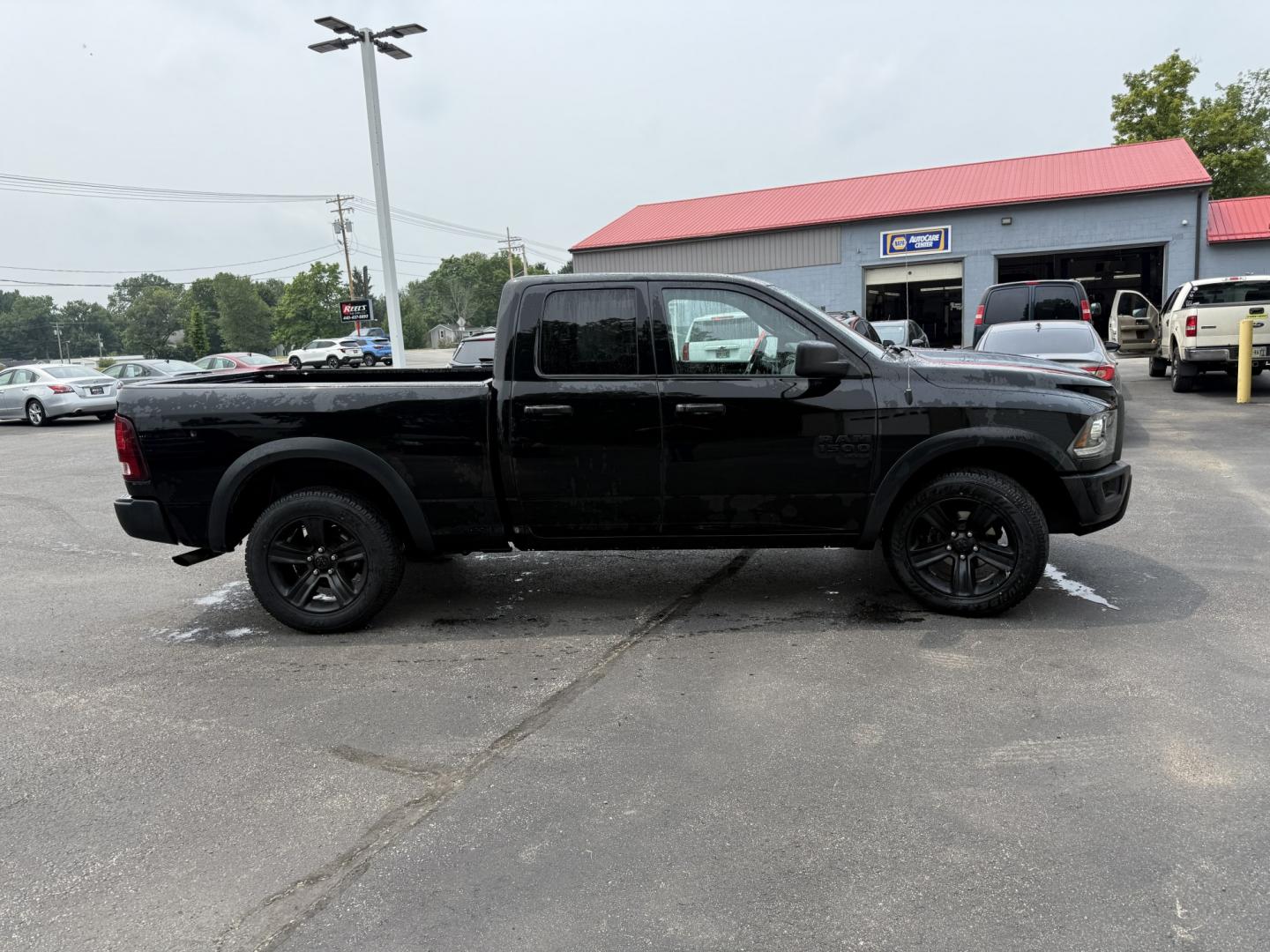 2021 Black /Black RAM 1500 Warlock Quad Cab 4WD (1C6RR7GG8MS) with an 3.6L V6 DOHC 24V engine, Automatic transmission, located at 547 E. Main St., Orwell, OH, 44076, (440) 437-5893, 41.535435, -80.847855 - 2021 Ram 1500 Classic Warlock Quad Cab 4WD – Rugged Style with Fresh All-Terrain Tires and Modern Tech! This 2021 Ram 1500 Classic Warlock Quad Cab 4WD is a bold, capable full-size truck that offers strong performance and modern convenience. Powered by a smooth 3.6L Pentastar V6 engine paired wit- Photo#25