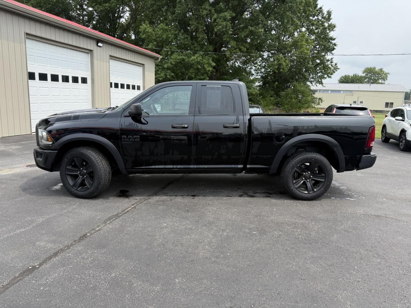 2021 Black /Black RAM 1500 Warlock Quad Cab 4WD (1C6RR7GG8MS) with an 3.6L V6 DOHC 24V engine, Automatic transmission, located at 547 E. Main St., Orwell, OH, 44076, (440) 437-5893, 41.535435, -80.847855 - 2021 Ram 1500 Classic Warlock Quad Cab 4WD – Rugged Style with Fresh All-Terrain Tires and Modern Tech! This 2021 Ram 1500 Classic Warlock Quad Cab 4WD is a bold, capable full-size truck that offers strong performance and modern convenience. Powered by a smooth 3.6L Pentastar V6 engine paired wit- Photo#32