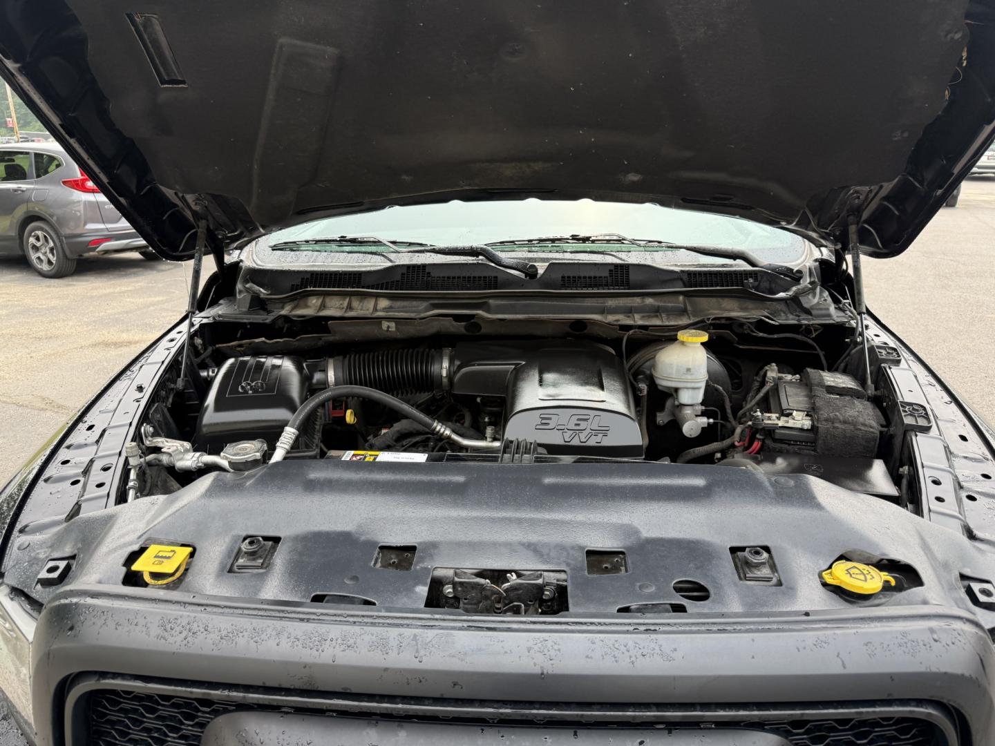 2021 Black /Black RAM 1500 Warlock Quad Cab 4WD (1C6RR7GG8MS) with an 3.6L V6 DOHC 24V engine, Automatic transmission, located at 547 E. Main St., Orwell, OH, 44076, (440) 437-5893, 41.535435, -80.847855 - 2021 Ram 1500 Classic Warlock Quad Cab 4WD – Rugged Style with Fresh All-Terrain Tires and Modern Tech! This 2021 Ram 1500 Classic Warlock Quad Cab 4WD is a bold, capable full-size truck that offers strong performance and modern convenience. Powered by a smooth 3.6L Pentastar V6 engine paired wit- Photo#10