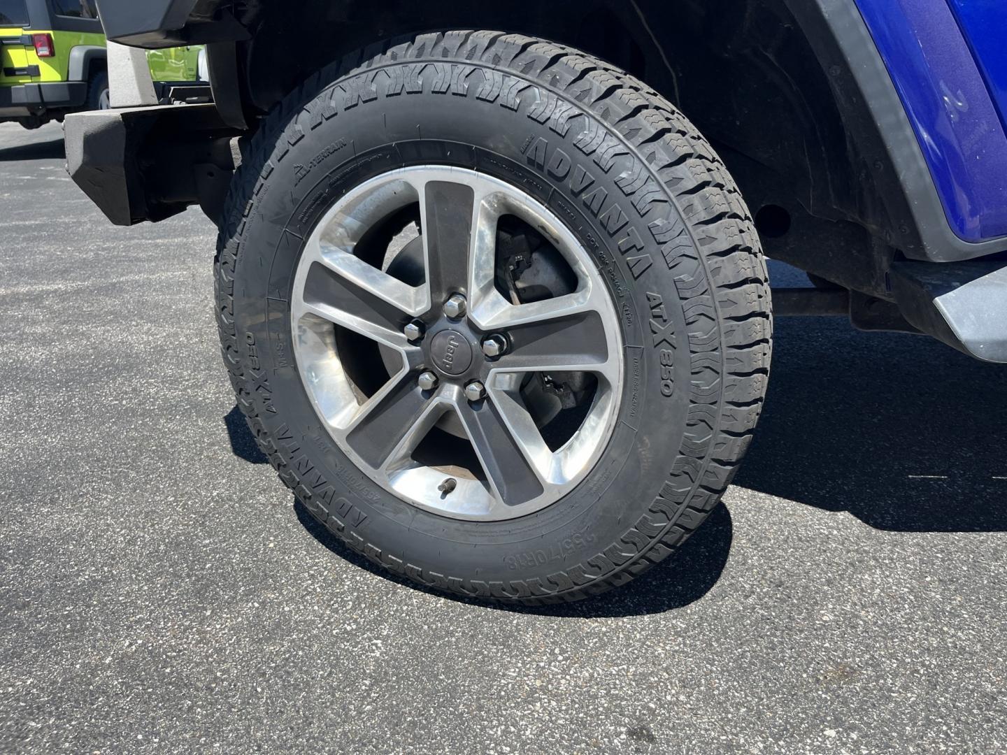 2018 Blue /Black Jeep Wrangler JL Unlimited Sahara (1C4HJXEGXJW) with an 3.6L V6 DOHC 24V engine, Automatic transmission, located at 547 E. Main St., Orwell, OH, 44076, (440) 437-5893, 41.535435, -80.847855 - 2018 Jeep Wrangler Unlimited Sahara 4WD – Iconic Off-Roader with Fresh All-Terrain Tires and Modern Features! This 2018 Jeep Wrangler Unlimited Sahara is a clean and capable 4-door that’s ready for trails or daily driving. Powered by the reliable 3.6L Pentastar V6 engine paired with a smooth 8-- Photo#13