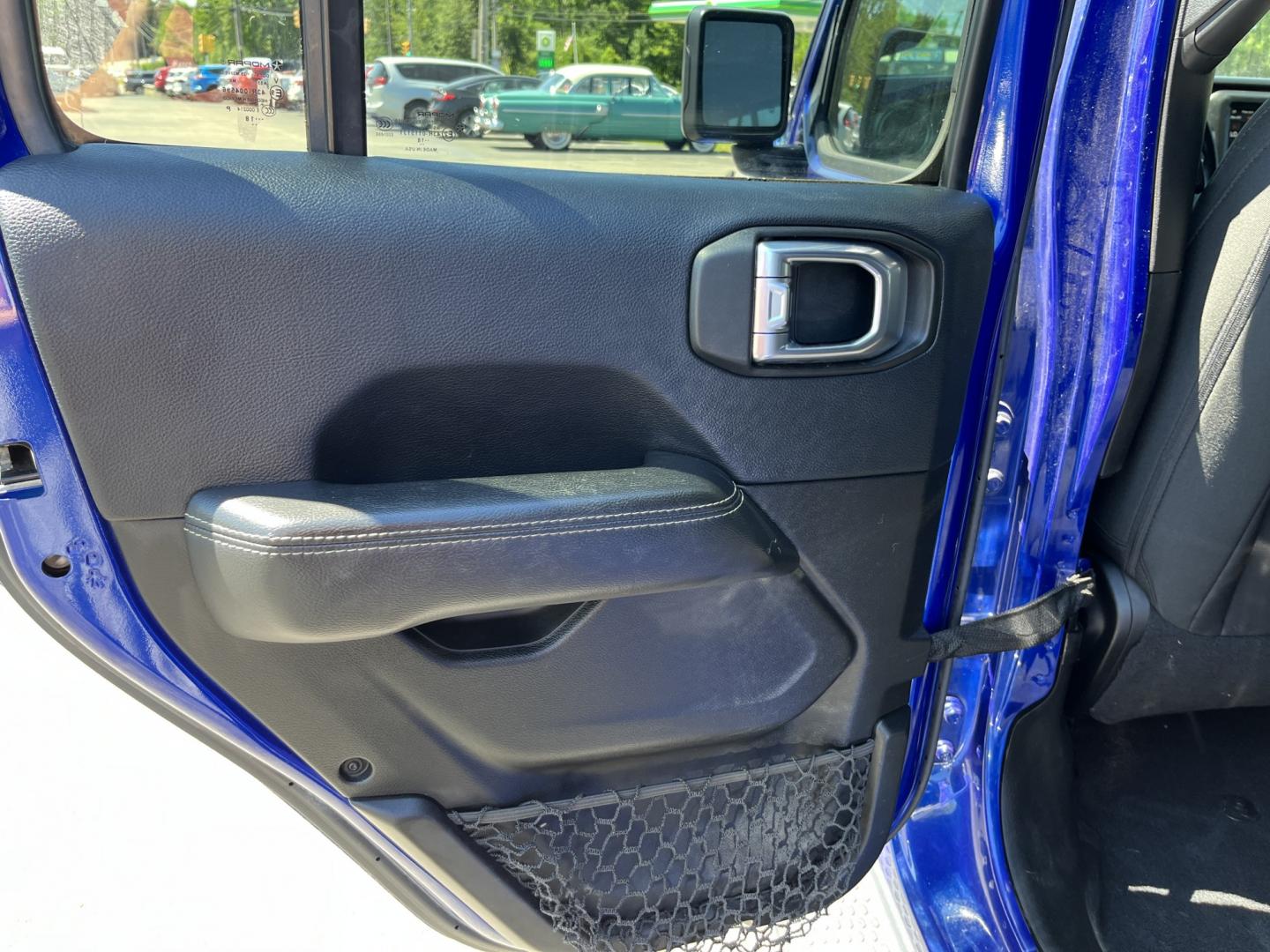 2018 Blue /Black Jeep Wrangler JL Unlimited Sahara (1C4HJXEGXJW) with an 3.6L V6 DOHC 24V engine, Automatic transmission, located at 547 E. Main St., Orwell, OH, 44076, (440) 437-5893, 41.535435, -80.847855 - 2018 Jeep Wrangler Unlimited Sahara 4WD – Iconic Off-Roader with Fresh All-Terrain Tires and Modern Features! This 2018 Jeep Wrangler Unlimited Sahara is a clean and capable 4-door that’s ready for trails or daily driving. Powered by the reliable 3.6L Pentastar V6 engine paired with a smooth 8-- Photo#30