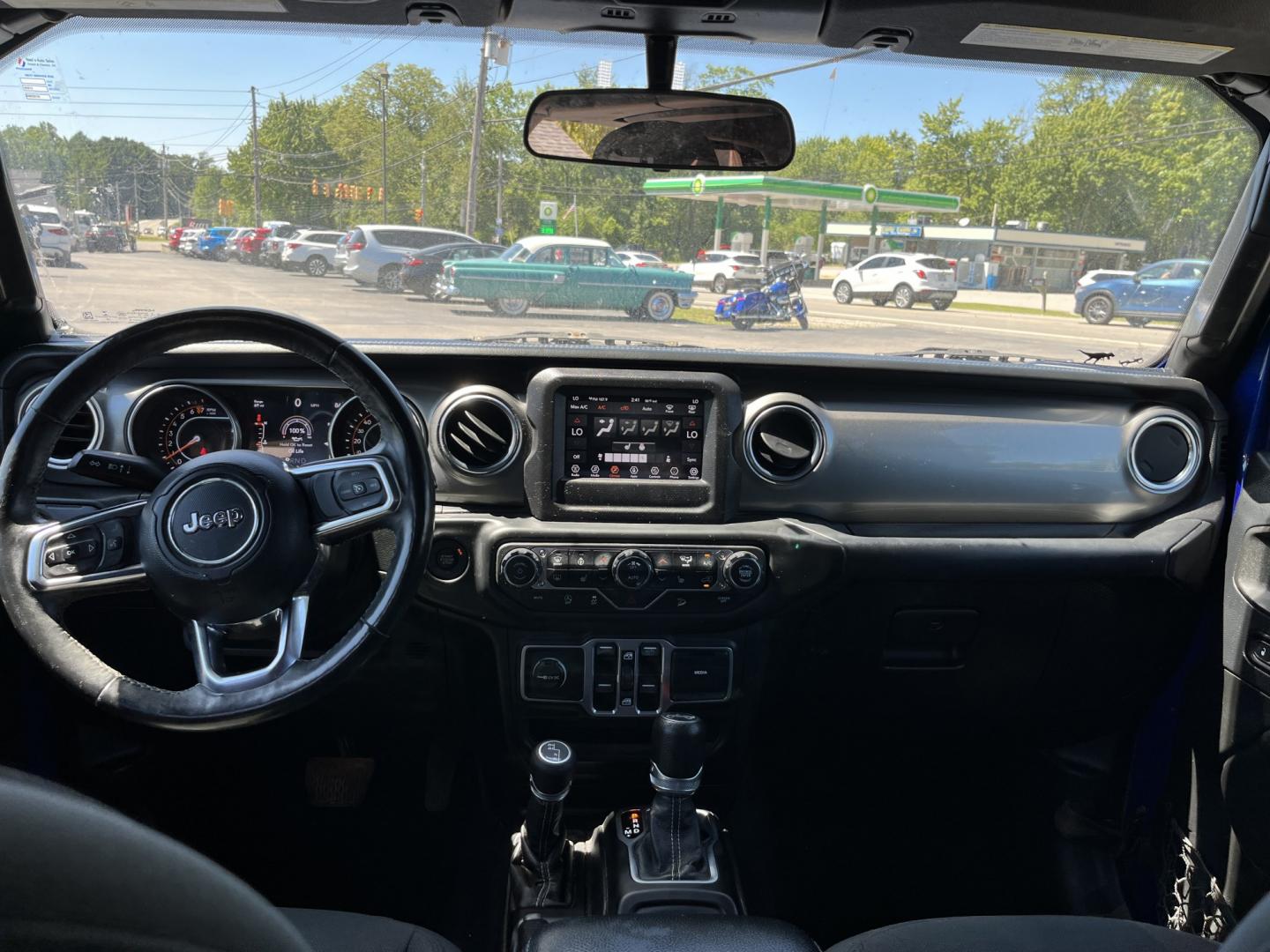 2018 Blue /Black Jeep Wrangler JL Unlimited Sahara (1C4HJXEGXJW) with an 3.6L V6 DOHC 24V engine, Automatic transmission, located at 547 E. Main St., Orwell, OH, 44076, (440) 437-5893, 41.535435, -80.847855 - 2018 Jeep Wrangler Unlimited Sahara 4WD – Iconic Off-Roader with Fresh All-Terrain Tires and Modern Features! This 2018 Jeep Wrangler Unlimited Sahara is a clean and capable 4-door that’s ready for trails or daily driving. Powered by the reliable 3.6L Pentastar V6 engine paired with a smooth 8-- Photo#33