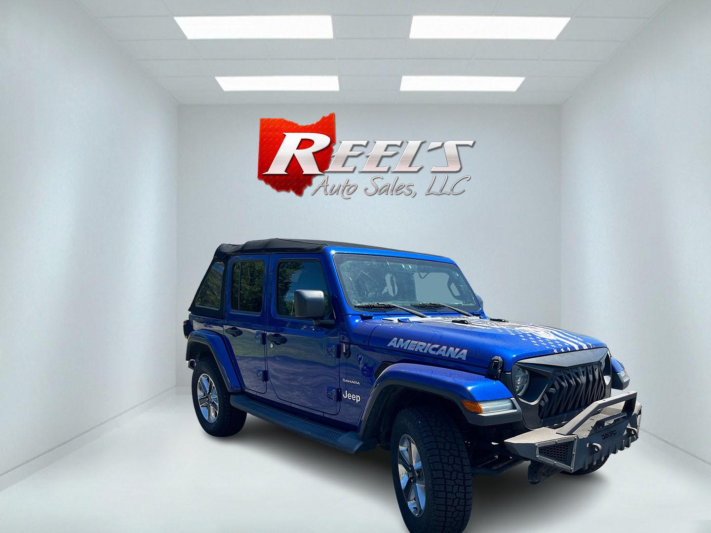 2018 Blue /Black Jeep Wrangler JL Unlimited Sahara (1C4HJXEGXJW) with an 3.6L V6 DOHC 24V engine, Automatic transmission, located at 547 E. Main St., Orwell, OH, 44076, (440) 437-5893, 41.535435, -80.847855 - 2018 Jeep Wrangler Unlimited Sahara 4WD – Iconic Off-Roader with Fresh All-Terrain Tires and Modern Features! This 2018 Jeep Wrangler Unlimited Sahara is a clean and capable 4-door that’s ready for trails or daily driving. Powered by the reliable 3.6L Pentastar V6 engine paired with a smooth 8-- Photo#3