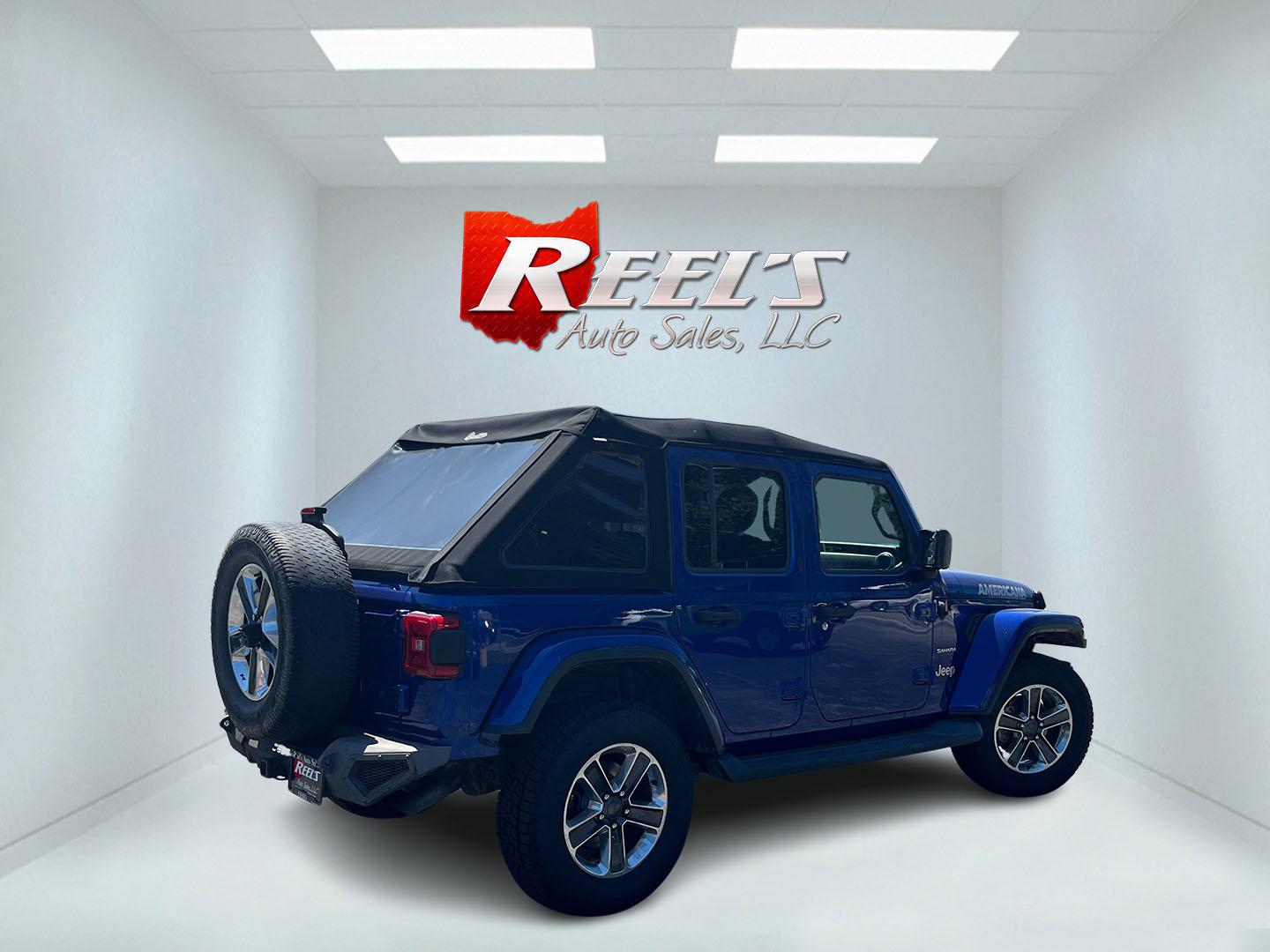 2018 Blue /Black Jeep Wrangler JL Unlimited Sahara (1C4HJXEGXJW) with an 3.6L V6 DOHC 24V engine, Automatic transmission, located at 547 E. Main St., Orwell, OH, 44076, (440) 437-5893, 41.535435, -80.847855 - 2018 Jeep Wrangler Unlimited Sahara 4WD – Iconic Off-Roader with Fresh All-Terrain Tires and Modern Features! This 2018 Jeep Wrangler Unlimited Sahara is a clean and capable 4-door that’s ready for trails or daily driving. Powered by the reliable 3.6L Pentastar V6 engine paired with a smooth 8-- Photo#7