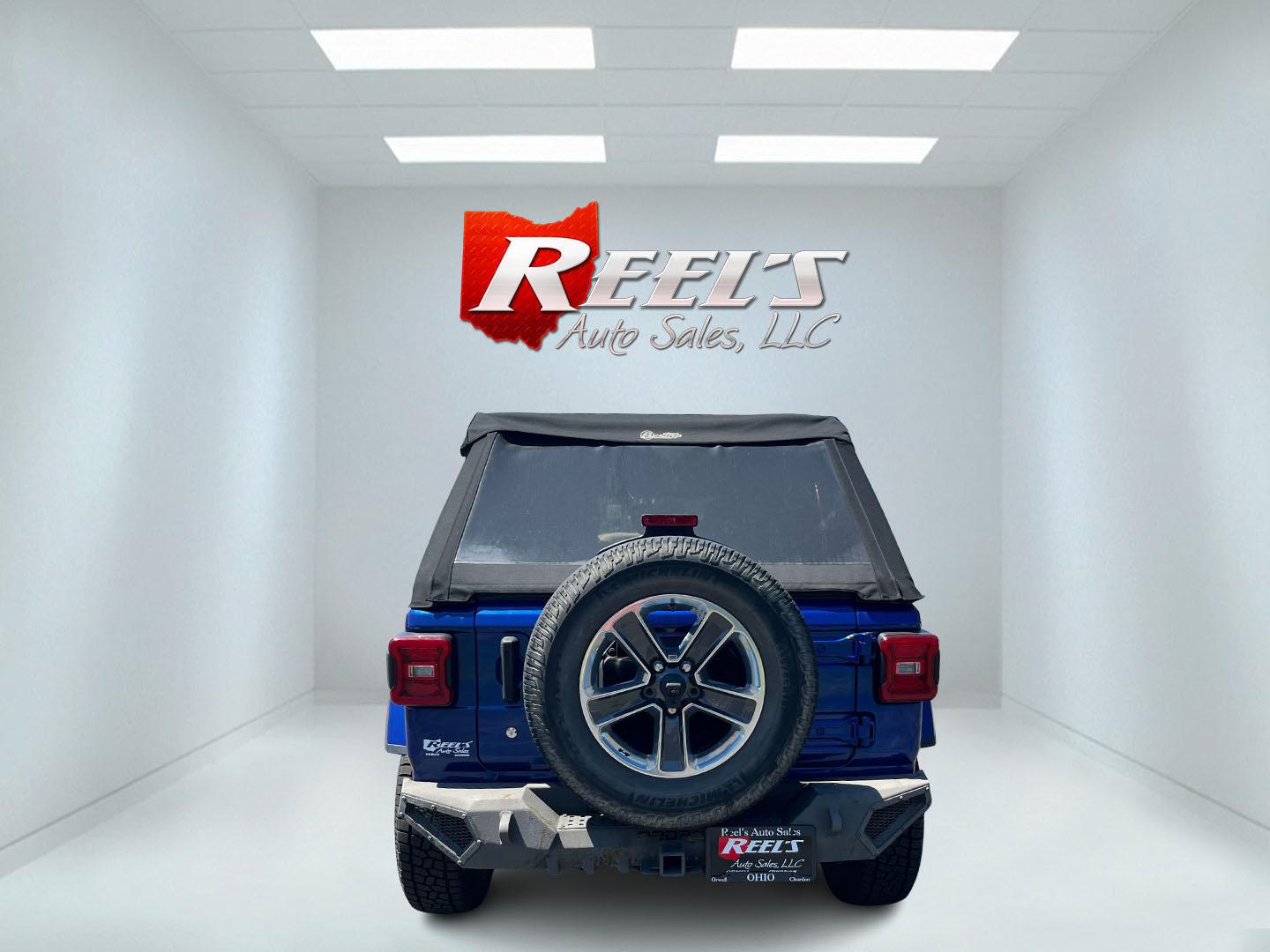 2018 Blue /Black Jeep Wrangler JL Unlimited Sahara (1C4HJXEGXJW) with an 3.6L V6 DOHC 24V engine, Automatic transmission, located at 547 E. Main St., Orwell, OH, 44076, (440) 437-5893, 41.535435, -80.847855 - 2018 Jeep Wrangler Unlimited Sahara 4WD – Iconic Off-Roader with Fresh All-Terrain Tires and Modern Features! This 2018 Jeep Wrangler Unlimited Sahara is a clean and capable 4-door that’s ready for trails or daily driving. Powered by the reliable 3.6L Pentastar V6 engine paired with a smooth 8-- Photo#9