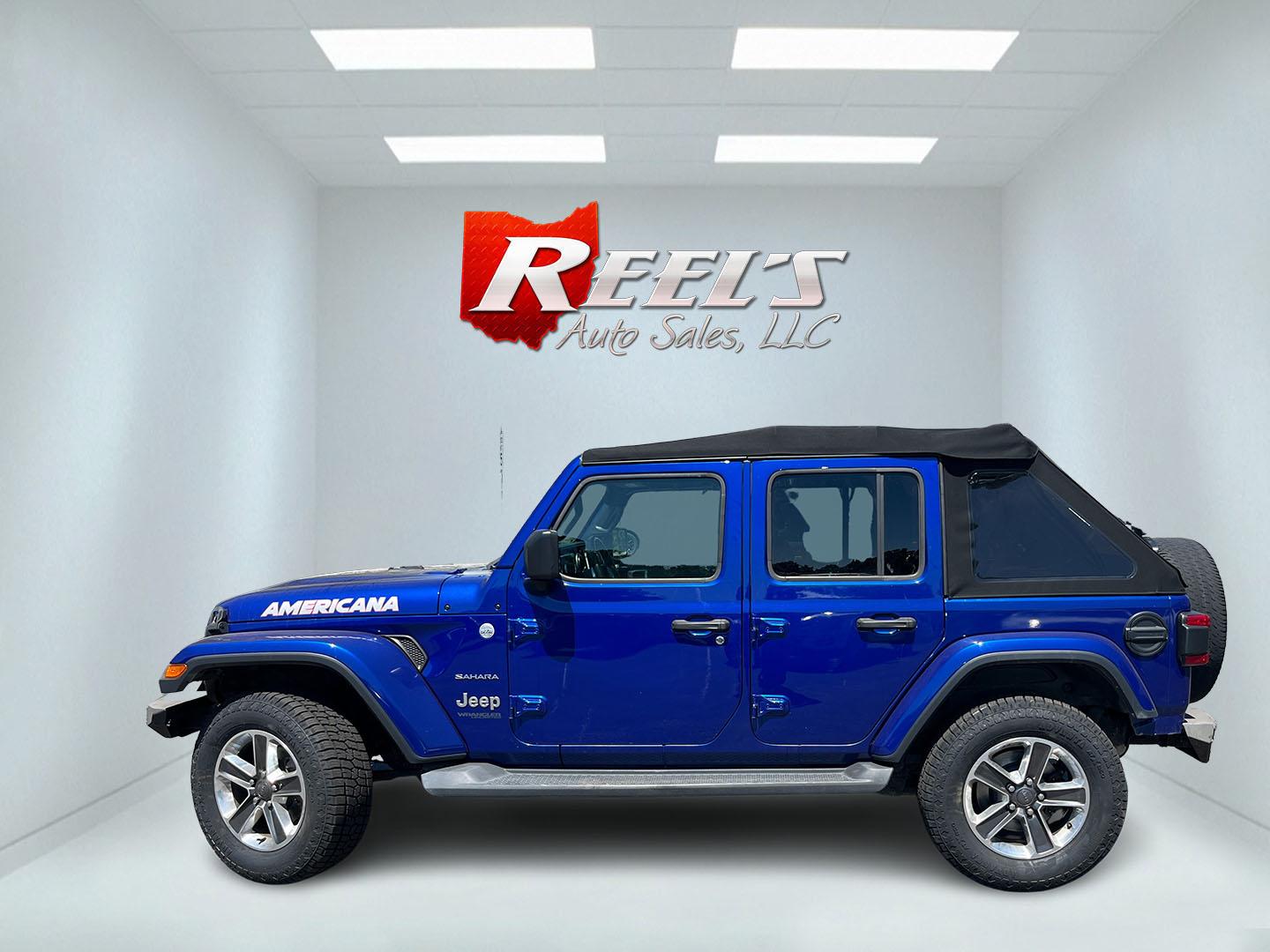 2018 Blue /Black Jeep Wrangler JL Unlimited Sahara (1C4HJXEGXJW) with an 3.6L V6 DOHC 24V engine, Automatic transmission, located at 547 E. Main St., Orwell, OH, 44076, (440) 437-5893, 41.535435, -80.847855 - 2018 Jeep Wrangler Unlimited Sahara 4WD – Iconic Off-Roader with Fresh All-Terrain Tires and Modern Features! This 2018 Jeep Wrangler Unlimited Sahara is a clean and capable 4-door that’s ready for trails or daily driving. Powered by the reliable 3.6L Pentastar V6 engine paired with a smooth 8-- Photo#12