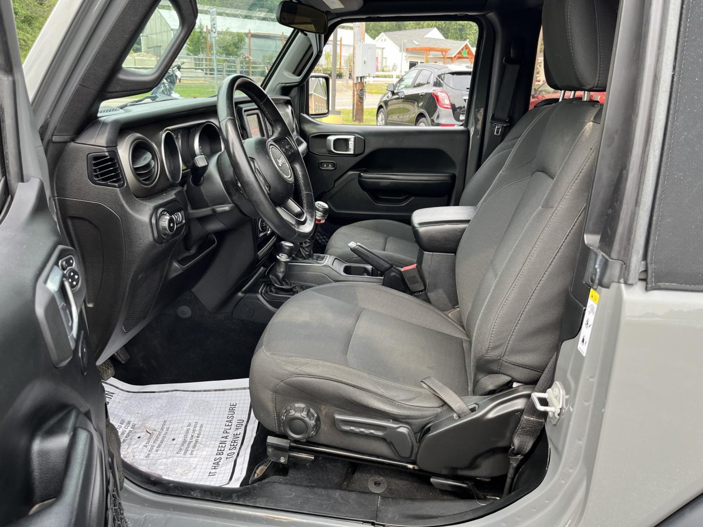 2019 Gray /Black Jeep Wrangler Sport 4WD (1C4GJXAG2KW) with an 3.6L V6 DOHC 24V FFV engine, 6 Speed Manual transmission, located at 11115 Chardon Rd. , Chardon, OH, 44024, (440) 214-9705, 41.580246, -81.241943 - 2019 Jeep Wrangler Sport S 4WD – Iconic Off-Roader with Manual Transmission and Fresh All-Terrain Tires! This 2019 Jeep Wrangler Sport S is a clean and capable 2-door that’s ready for trails or daily driving. Powered by the reliable 3.6L Pentastar V6 engine paired with a fun 6-speed manual tran- Photo#16