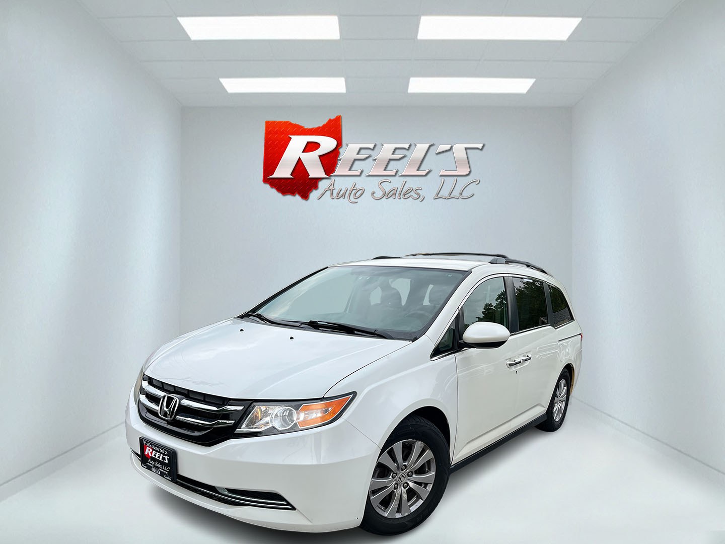 2016 White /Gray Honda Odyssey EX (5FNRL5H49GB) with an 3.5L V6 SOHC 24V engine, Automatic transmission, located at 11115 Chardon Rd. , Chardon, OH, 44024, (440) 214-9705, 41.580246, -81.241943 - 2016 Honda Odyssey EX – Spacious Family Minivan with Reliable V6 Power and Modern Features! This 2016 Honda Odyssey EX is a practical and family-friendly minivan that offers generous space and dependable performance. Powered by a smooth 3.5L V6 engine paired with a responsive 6-speed automatic tr- Photo#0