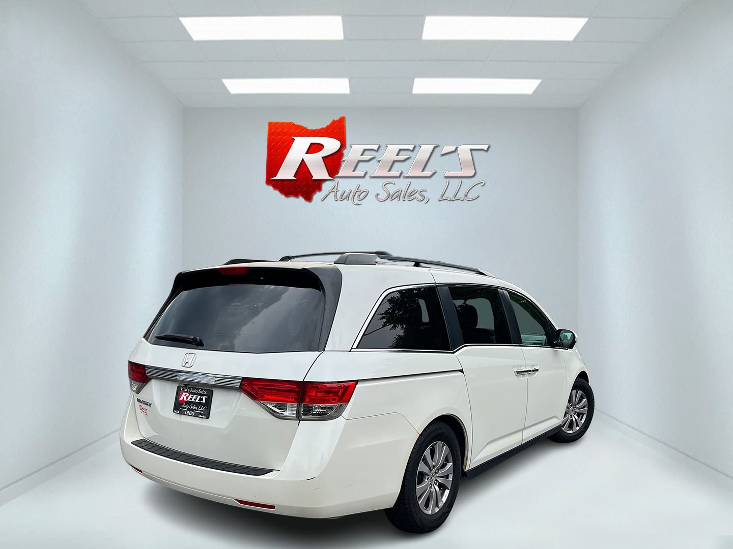 2016 White /Gray Honda Odyssey EX (5FNRL5H49GB) with an 3.5L V6 SOHC 24V engine, Automatic transmission, located at 11115 Chardon Rd. , Chardon, OH, 44024, (440) 214-9705, 41.580246, -81.241943 - 2016 Honda Odyssey EX – Spacious Family Minivan with Reliable V6 Power and Modern Features! This 2016 Honda Odyssey EX is a practical and family-friendly minivan that offers generous space and dependable performance. Powered by a smooth 3.5L V6 engine paired with a responsive 6-speed automatic tr- Photo#6
