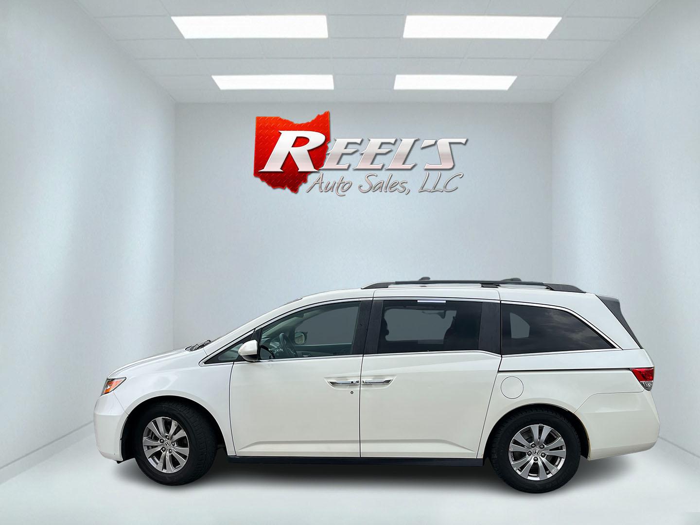 2016 White /Gray Honda Odyssey EX (5FNRL5H49GB) with an 3.5L V6 SOHC 24V engine, Automatic transmission, located at 11115 Chardon Rd. , Chardon, OH, 44024, (440) 214-9705, 41.580246, -81.241943 - 2016 Honda Odyssey EX – Spacious Family Minivan with Reliable V6 Power and Modern Features! This 2016 Honda Odyssey EX is a practical and family-friendly minivan that offers generous space and dependable performance. Powered by a smooth 3.5L V6 engine paired with a responsive 6-speed automatic tr- Photo#11