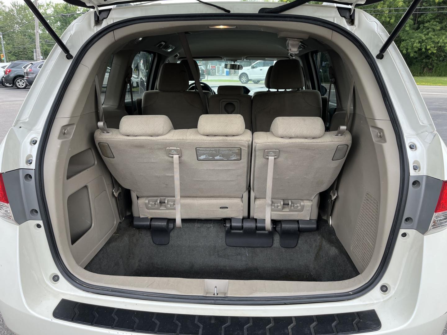 2016 White /Gray Honda Odyssey EX (5FNRL5H49GB) with an 3.5L V6 SOHC 24V engine, Automatic transmission, located at 11115 Chardon Rd. , Chardon, OH, 44024, (440) 214-9705, 41.580246, -81.241943 - 2016 Honda Odyssey EX – Spacious Family Minivan with Reliable V6 Power and Modern Features! This 2016 Honda Odyssey EX is a practical and family-friendly minivan that offers generous space and dependable performance. Powered by a smooth 3.5L V6 engine paired with a responsive 6-speed automatic tr- Photo#14