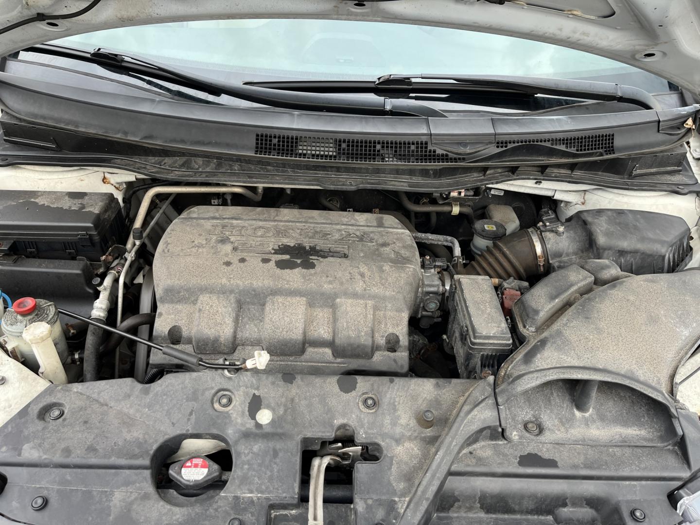 2016 White /Gray Honda Odyssey EX (5FNRL5H49GB) with an 3.5L V6 SOHC 24V engine, Automatic transmission, located at 11115 Chardon Rd. , Chardon, OH, 44024, (440) 214-9705, 41.580246, -81.241943 - 2016 Honda Odyssey EX – Spacious Family Minivan with Reliable V6 Power and Modern Features! This 2016 Honda Odyssey EX is a practical and family-friendly minivan that offers generous space and dependable performance. Powered by a smooth 3.5L V6 engine paired with a responsive 6-speed automatic tr- Photo#13